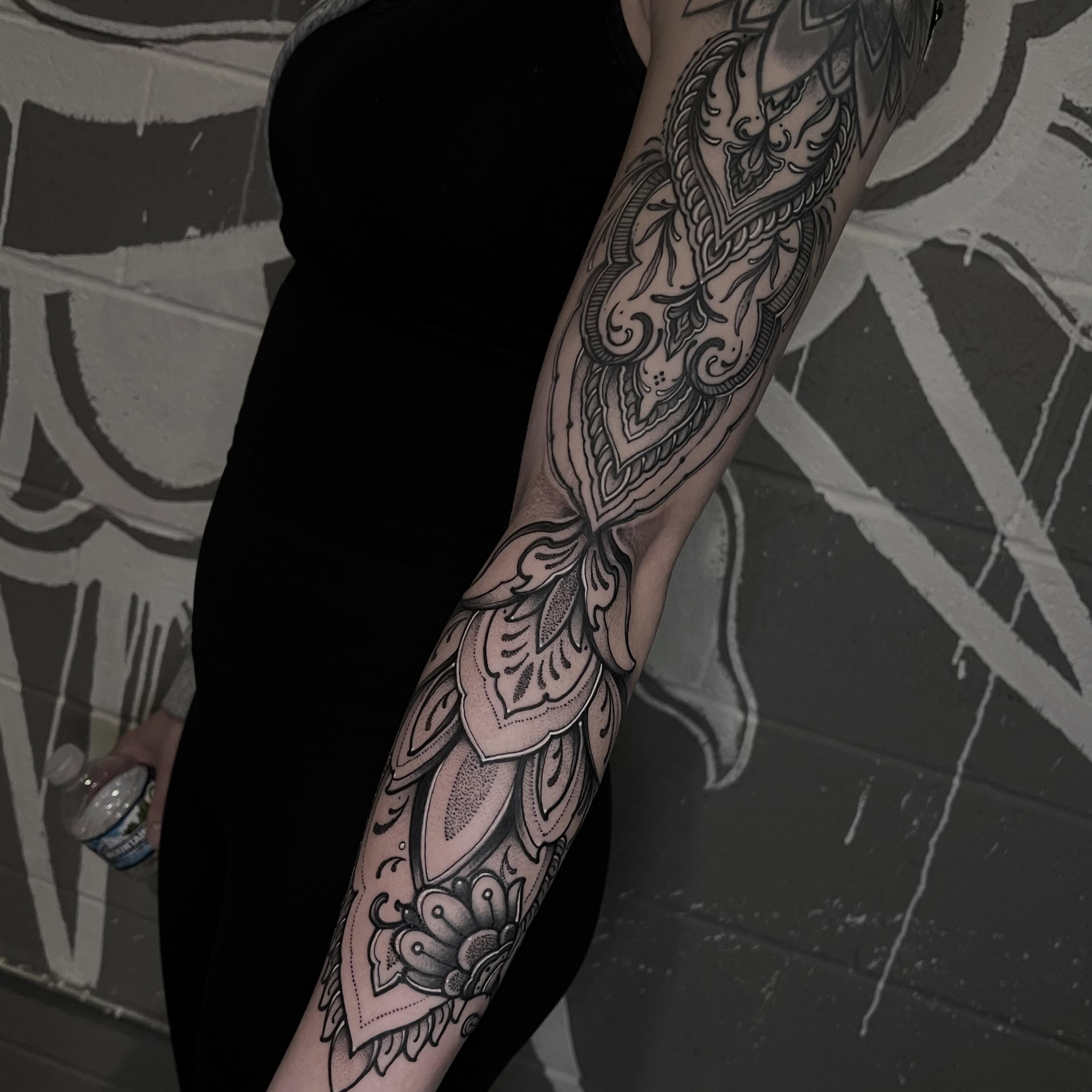 Floral mandala ornamental tattoo on the forearm by Brandon Mola, Chicago, Illinois