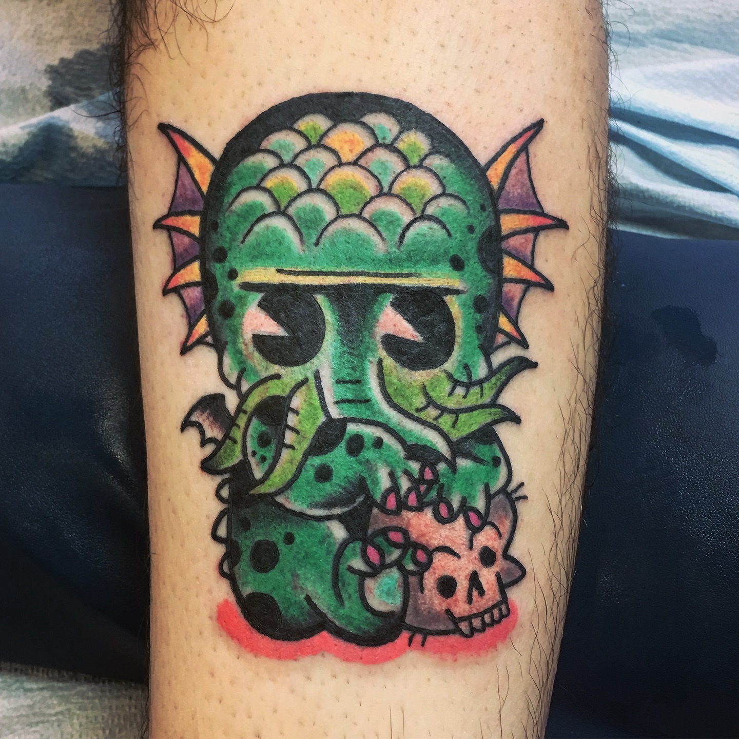 Dragon American traditional tattoo on the forearm by Aidan Monahan Tattoo
