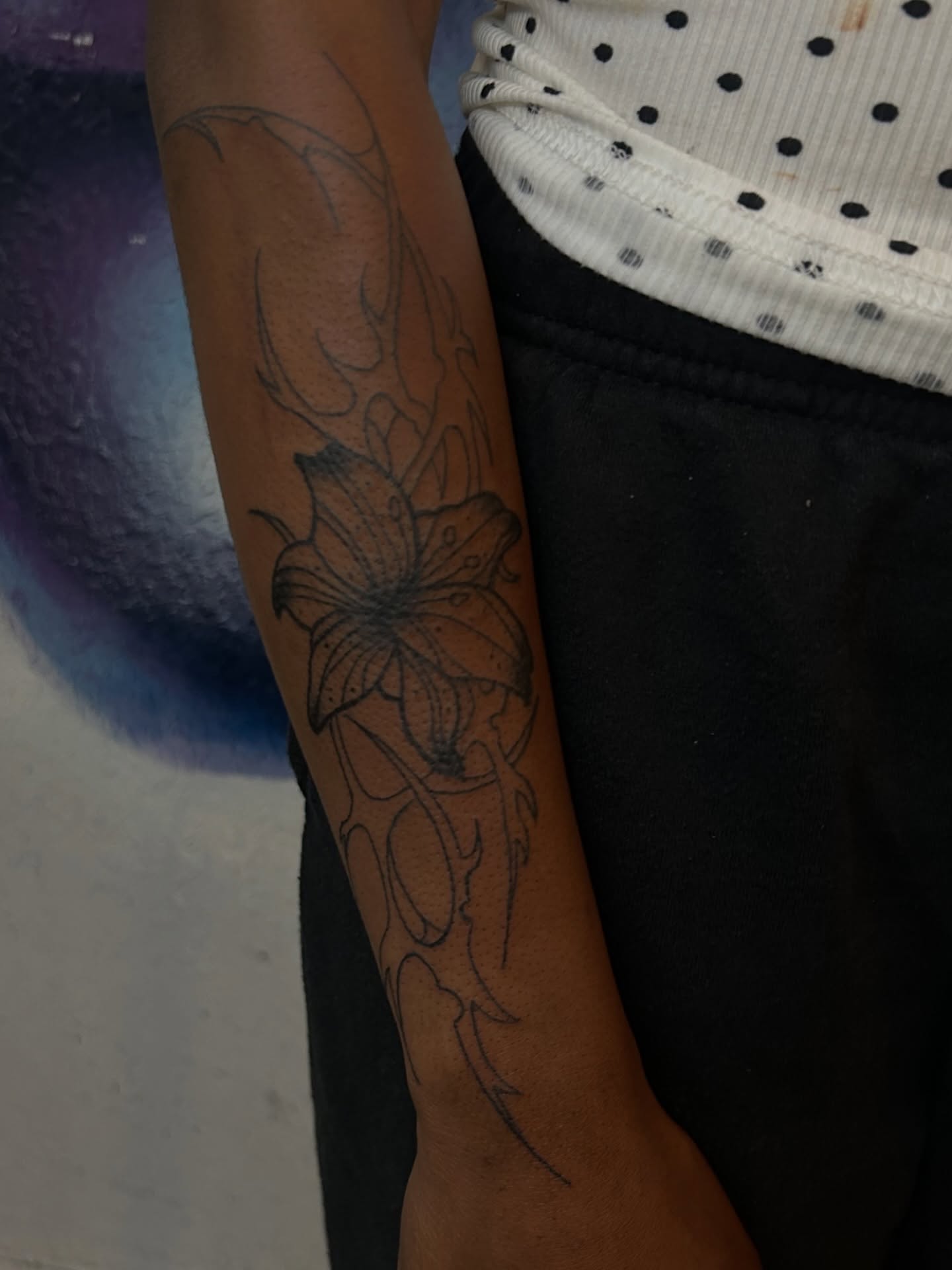 Floral design black and grey tattoo on the forearm by Miss Moezartt the Multidisciplinary
