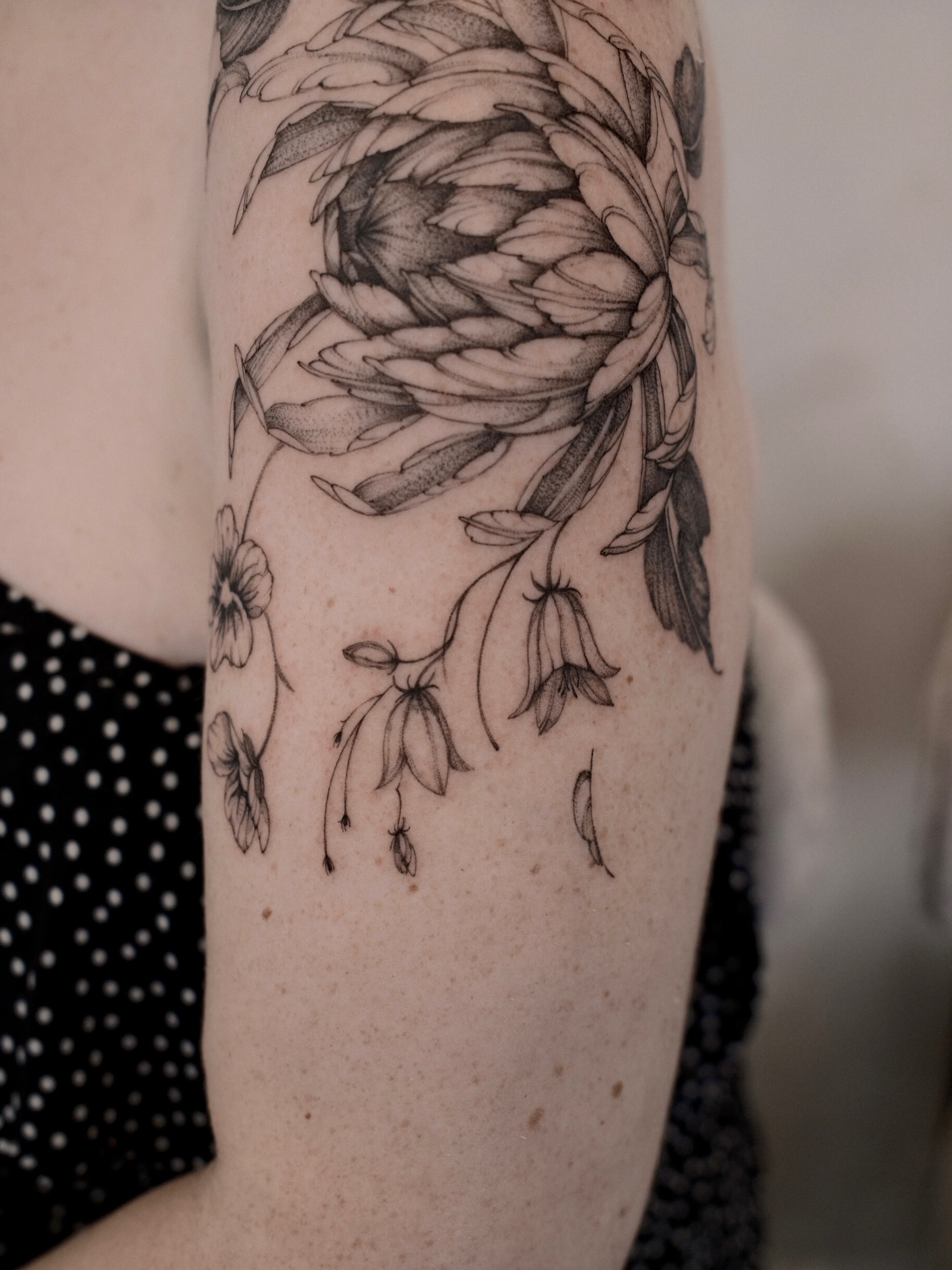Floral arrangement dotwork tattoo on the forearm by Joy, Gold Coast, Queensland