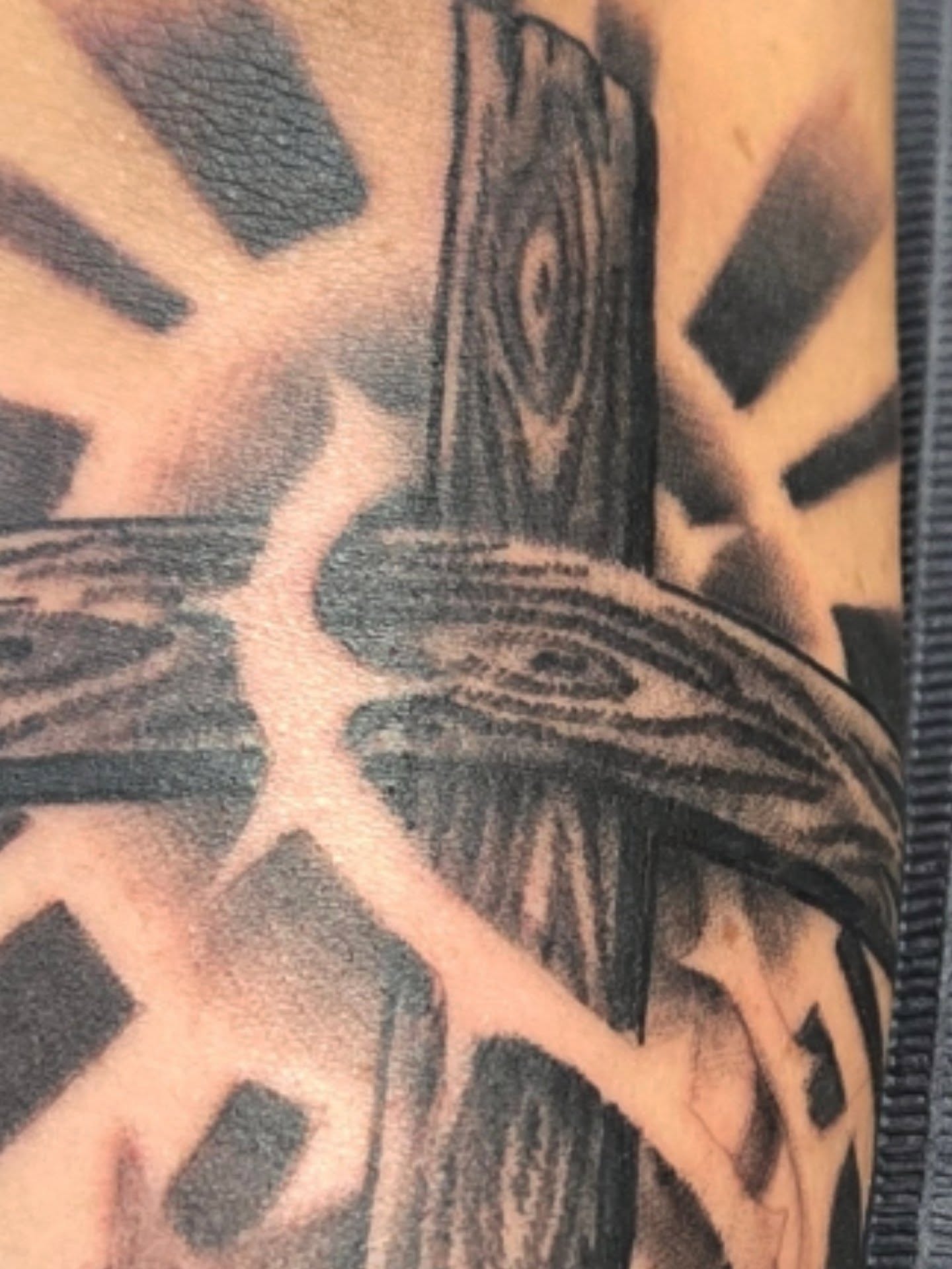 Geometric pattern geometric tattoo on the upper arm by Cee Vann, Greensboro, North Carolina