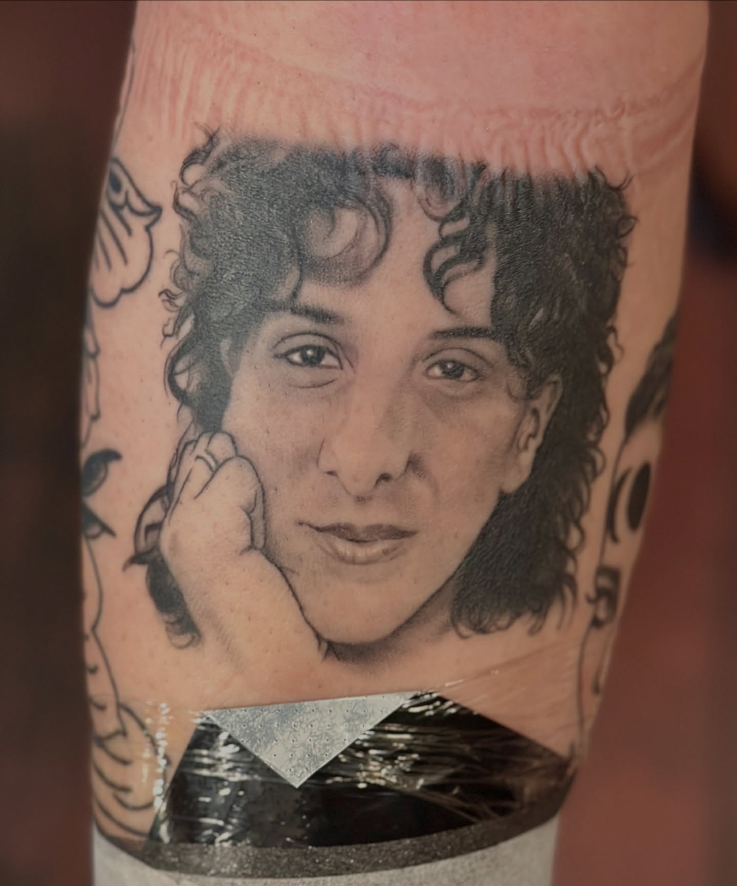 Portrait realism tattoo on the forearm by Holly Ellis, San Francisco, California
