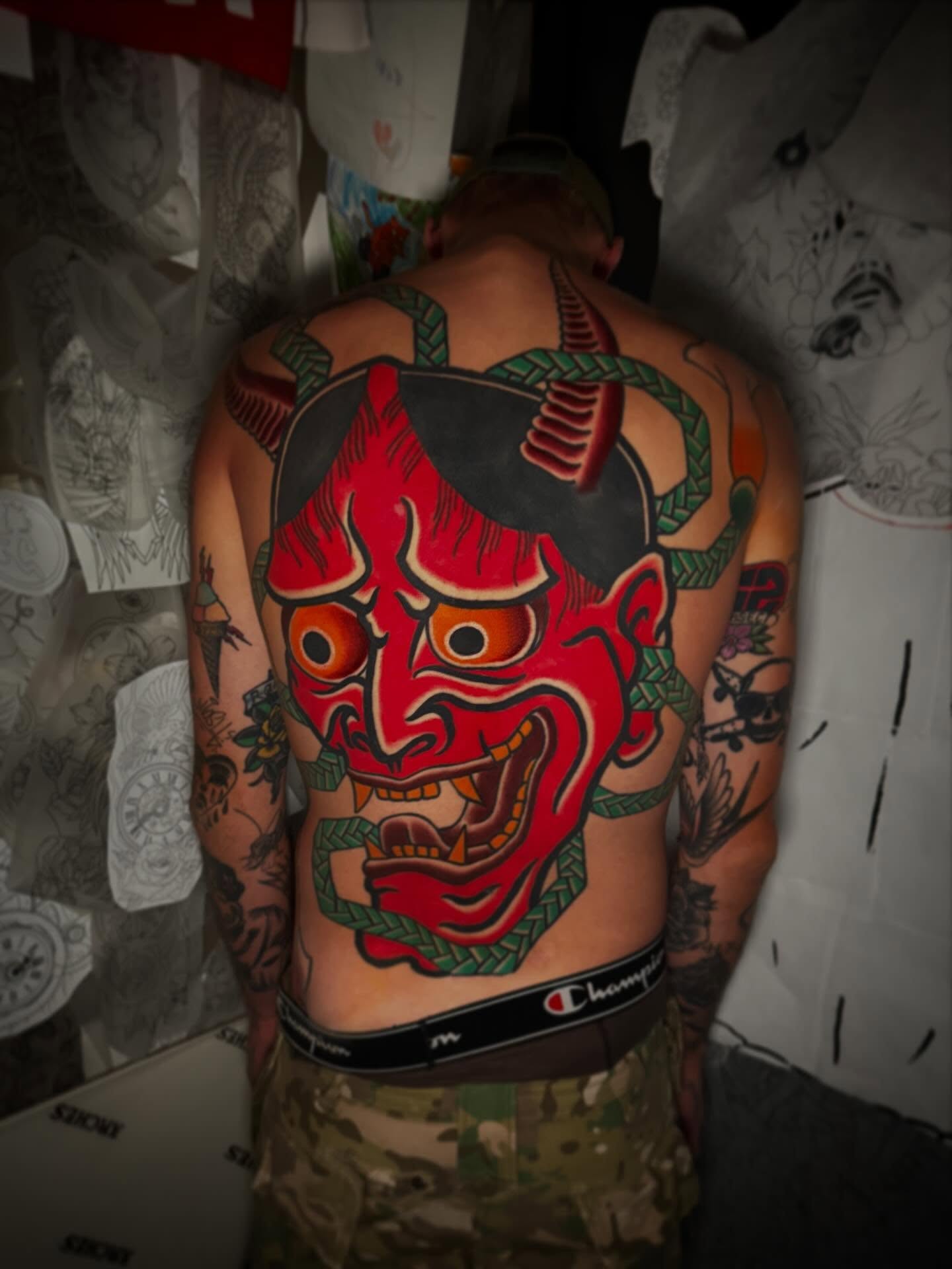 Demon mask japanese irezumi tattoo on the back by Mike Diamond