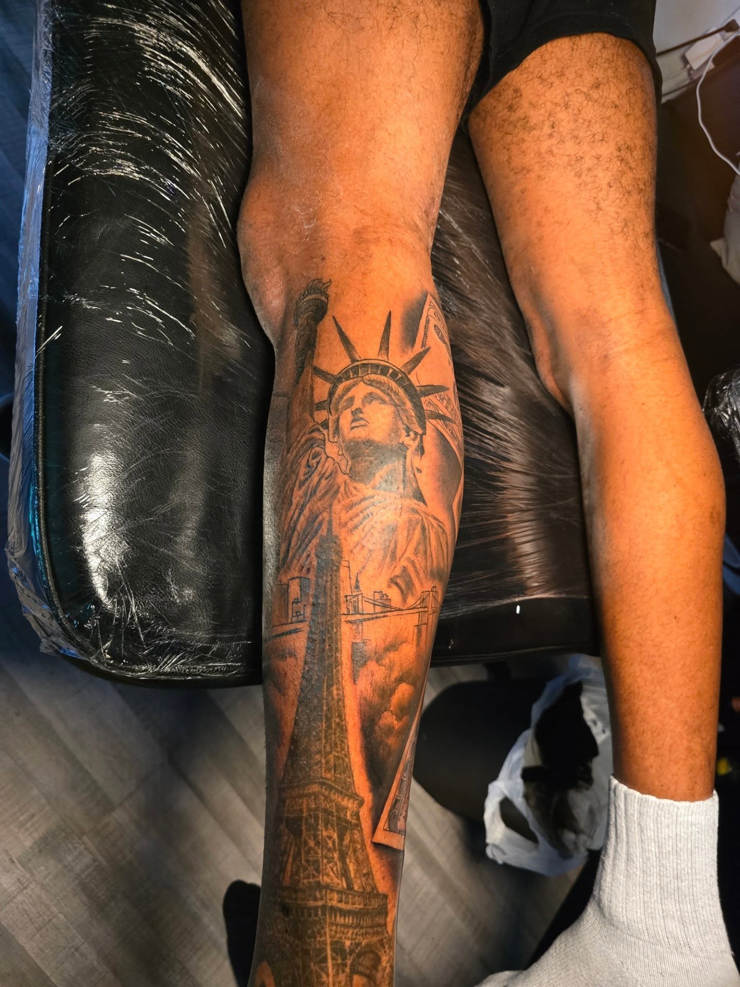Statue of liberty black and grey tattoo on the forearm by Klazzik Mayfield, Fort Lauderdale, Florida