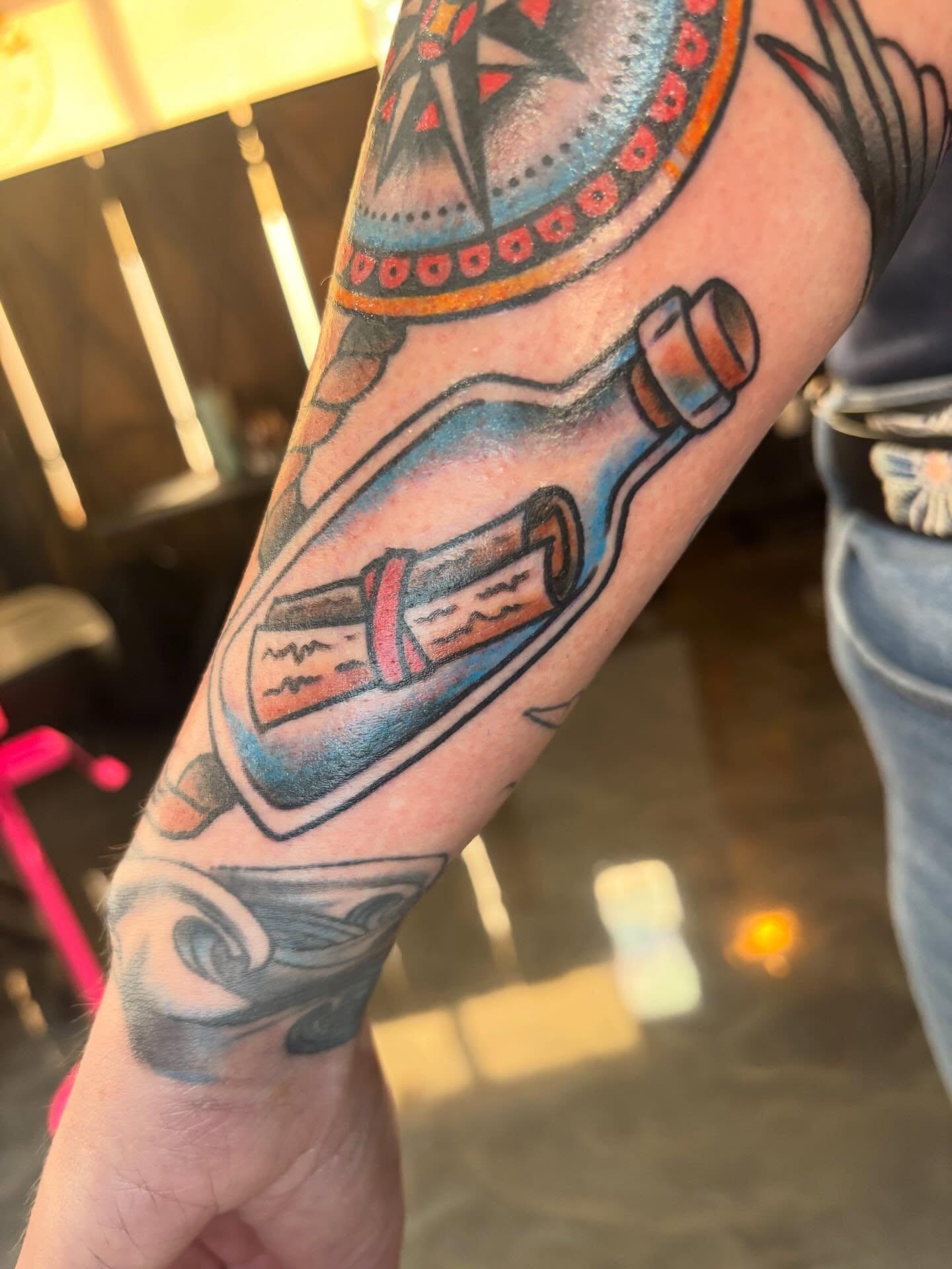Message in a bottle American traditional tattoo on the forearm by Alex Green, Nashville, Tennessee