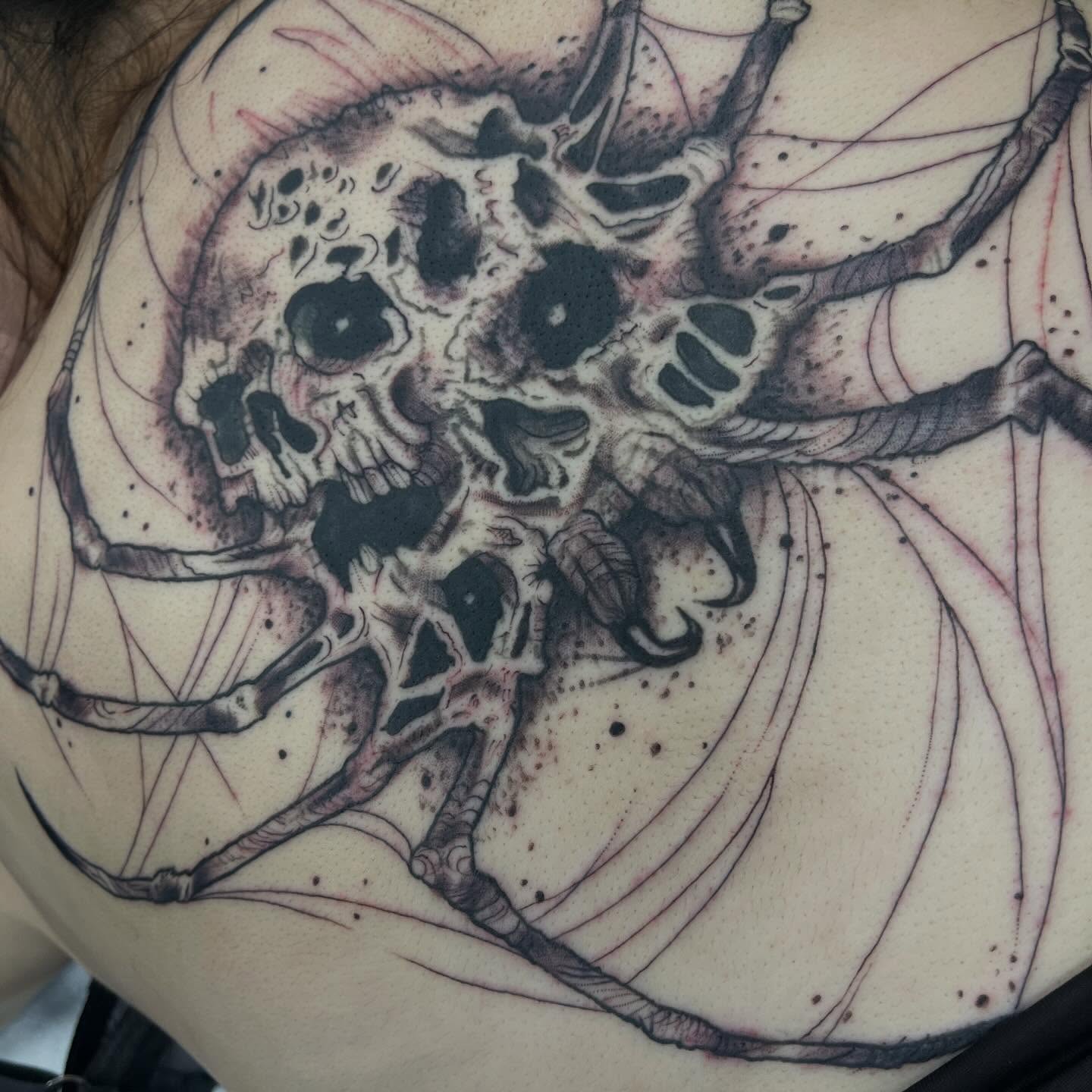 Skull realism tattoo on the shoulder by Brianna Jo Ballinghoff