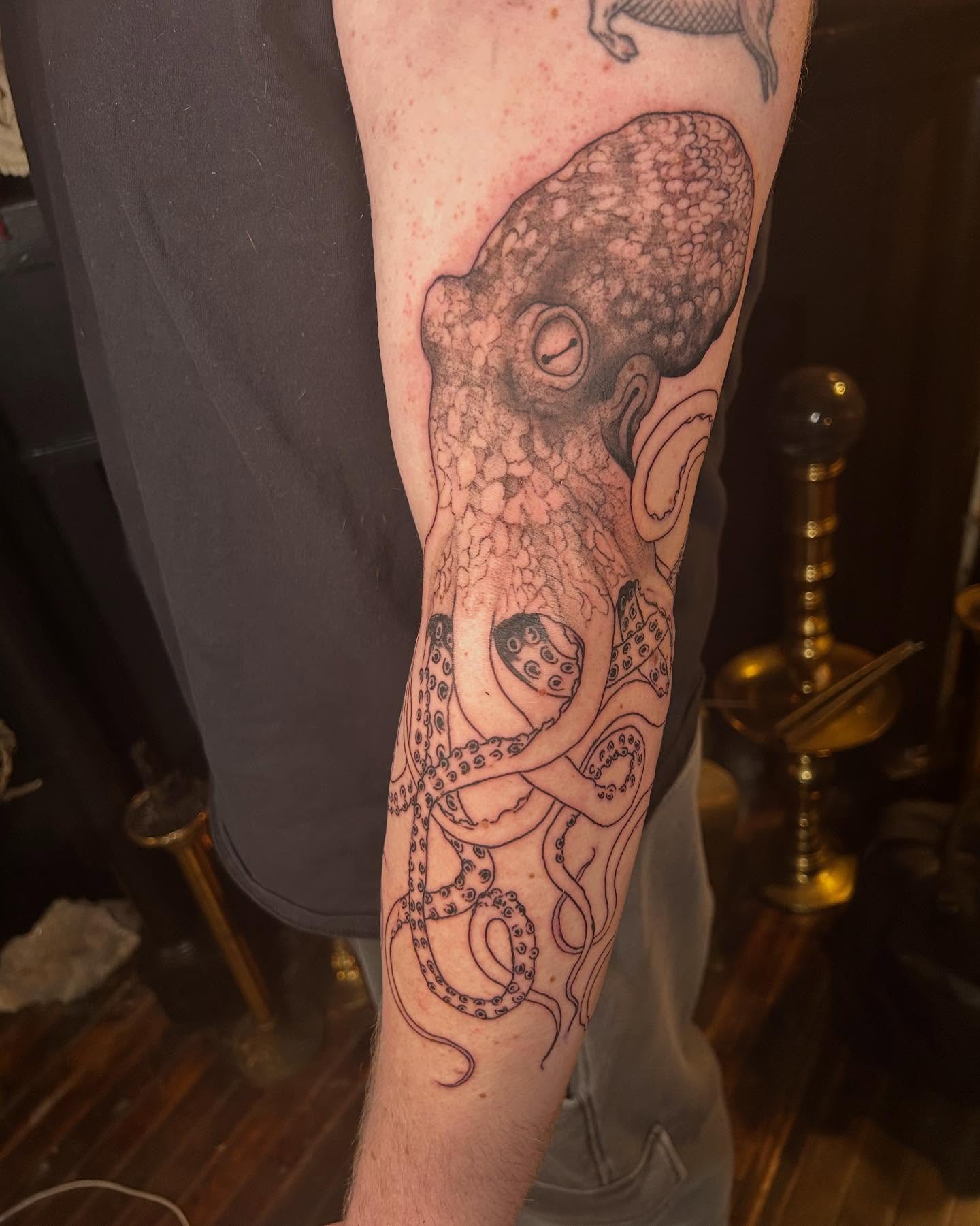 Octopus black and grey tattoo on the forearm by ๐๐๐๐๐๐ ๐๐๐๐๐๐ ๐๐๐๐๐๐