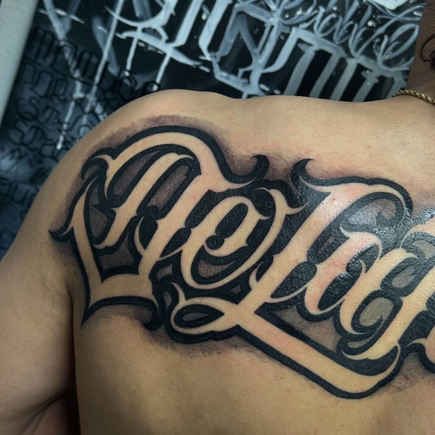 Script lettering lettering script tattoo on the shoulder by El Beaver Tattoos