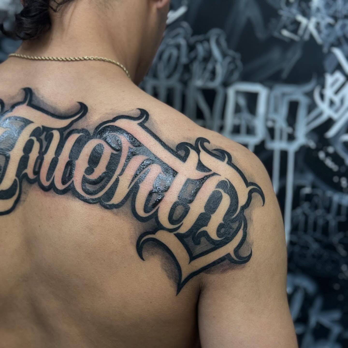 Script lettering lettering script tattoo on the shoulder by El Beaver Tattoos