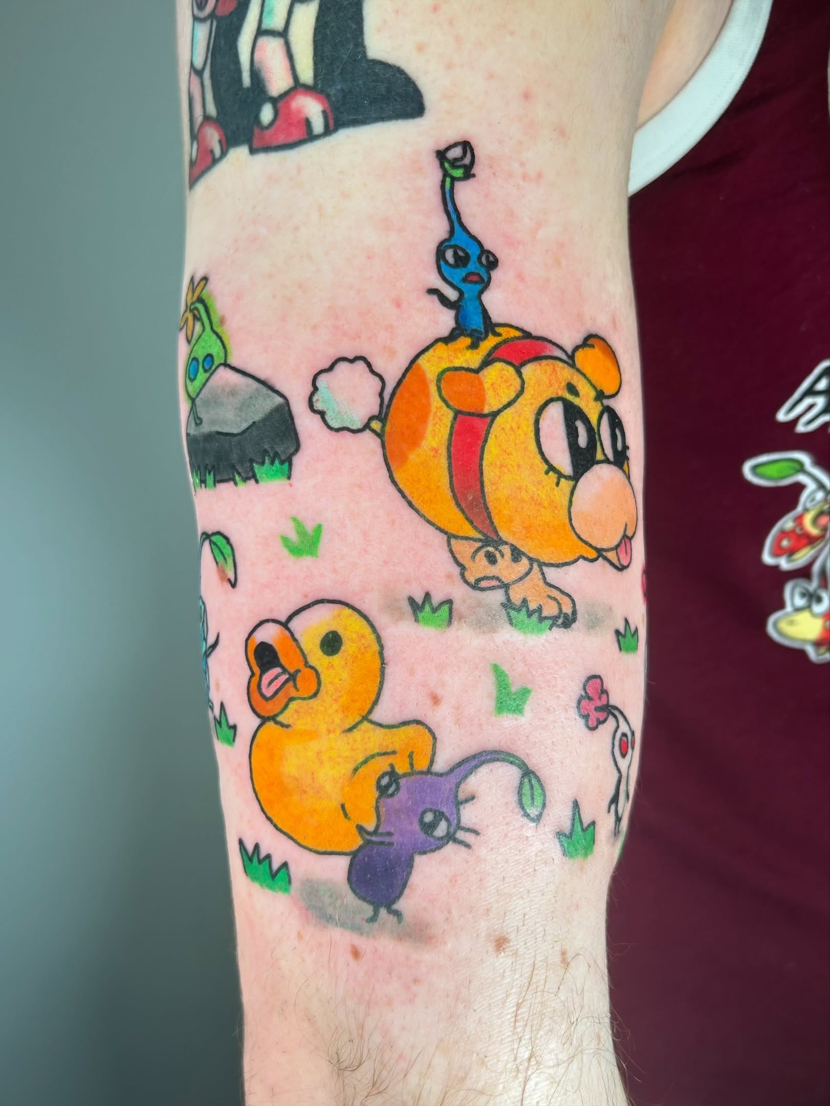 Animal characters new school tattoo on the forearm by Ollie