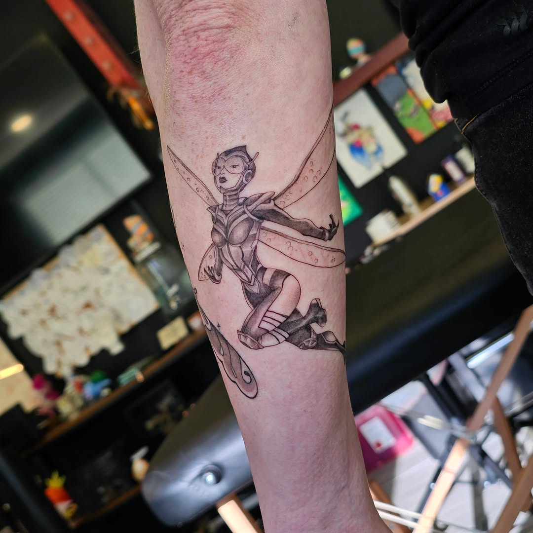 Anime character anime tattoo on the forearm by Casey Jo