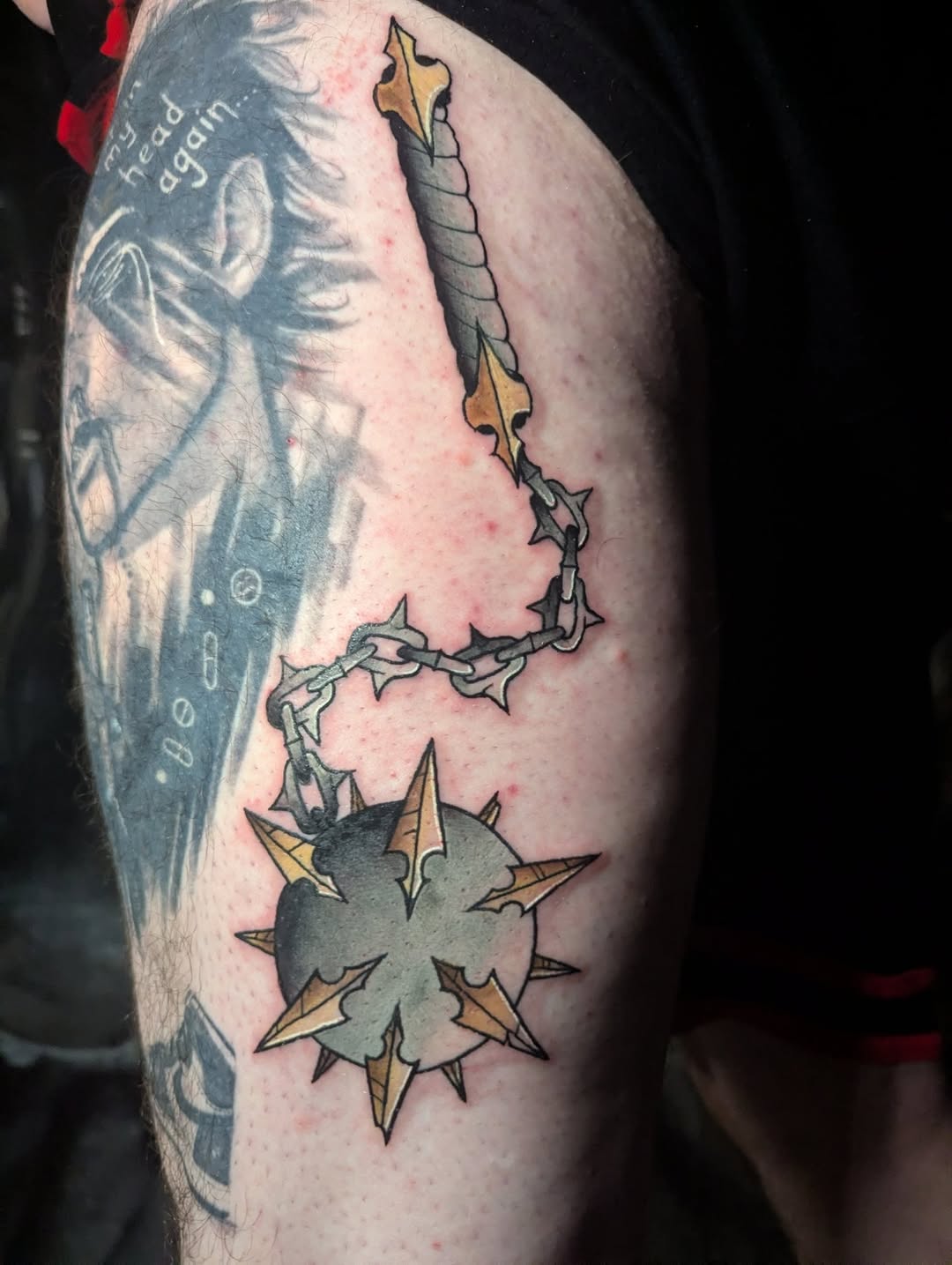Flail mace anime tattoo on the forearm by Payton