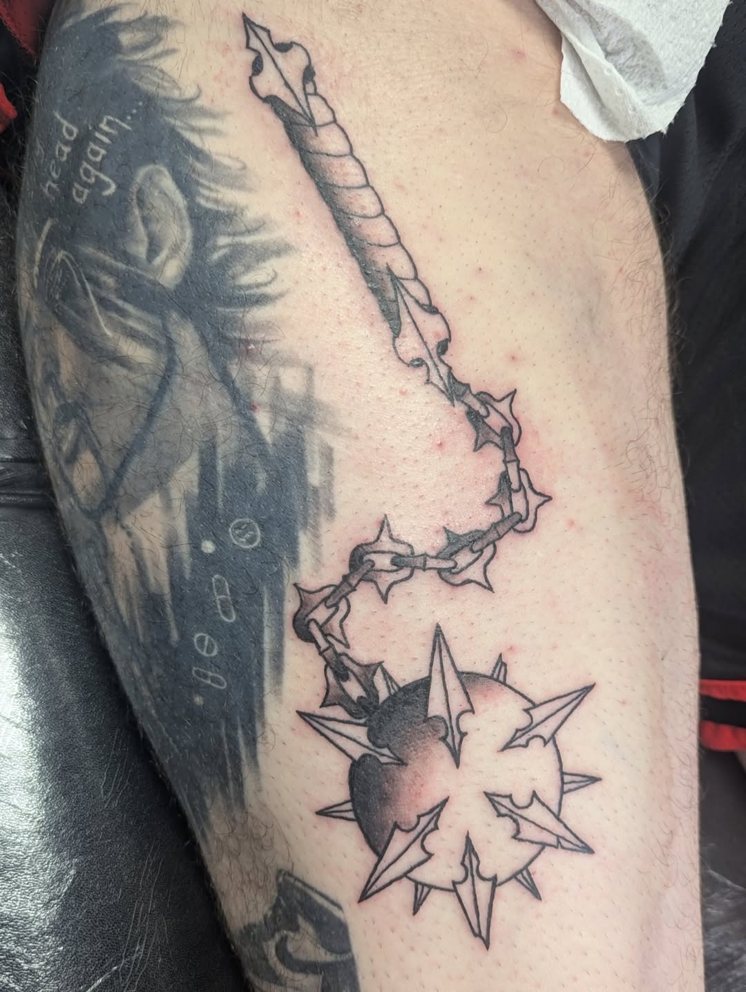 Flail weapon tattoo on the forearm by Payton