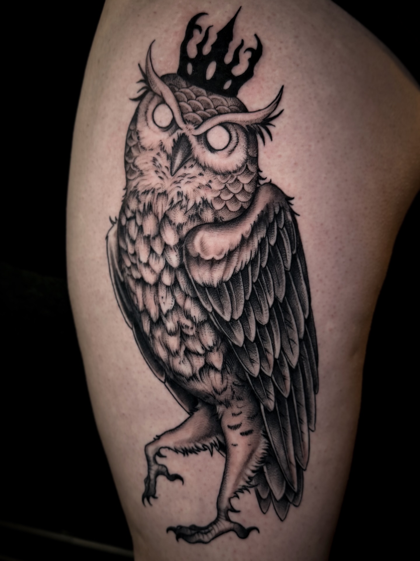 Owl black and grey tattoo on the thigh by Cristen Aro