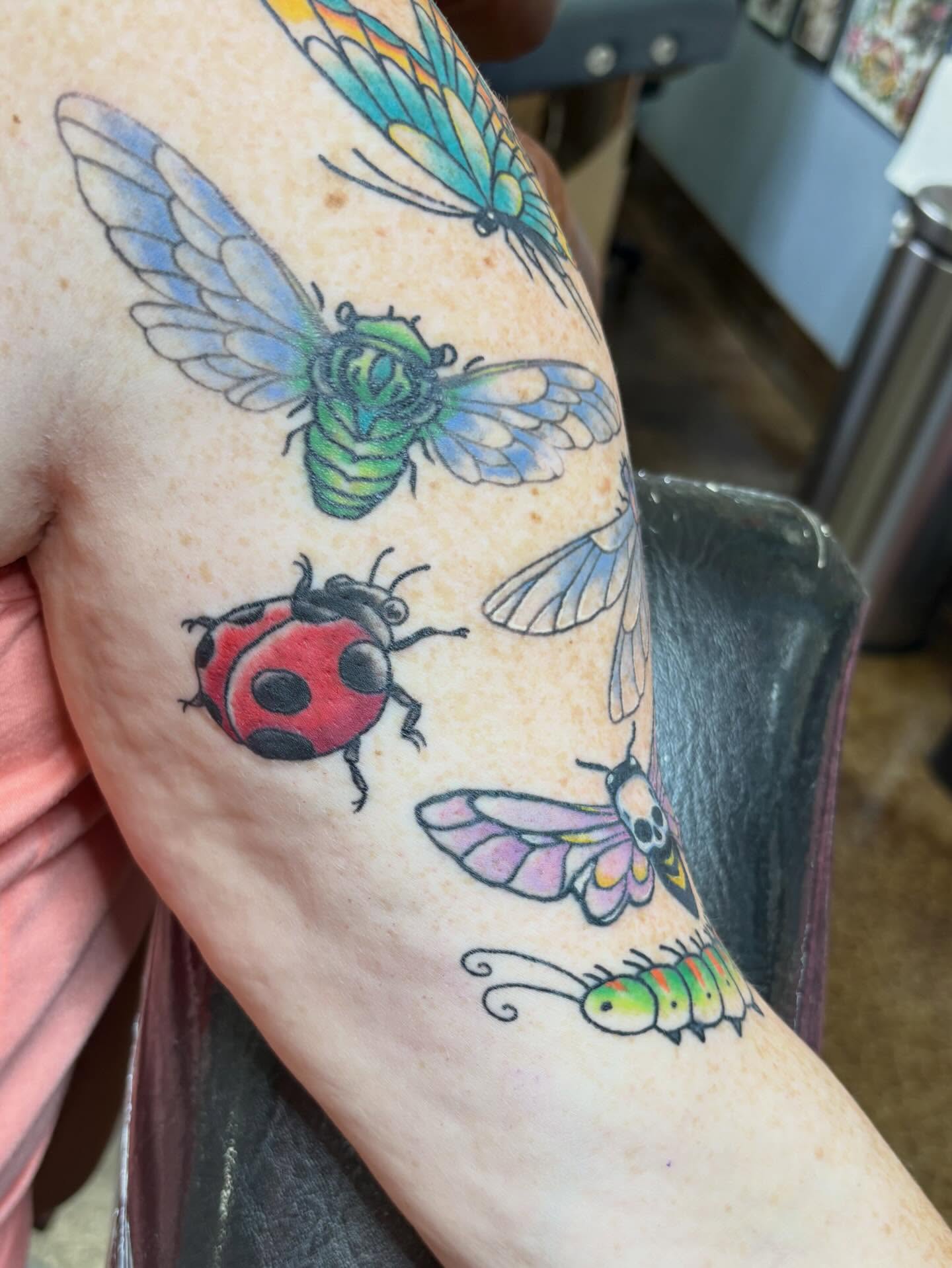 Insects new school tattoo on the forearm by Gabby, Kansas City, Missouri