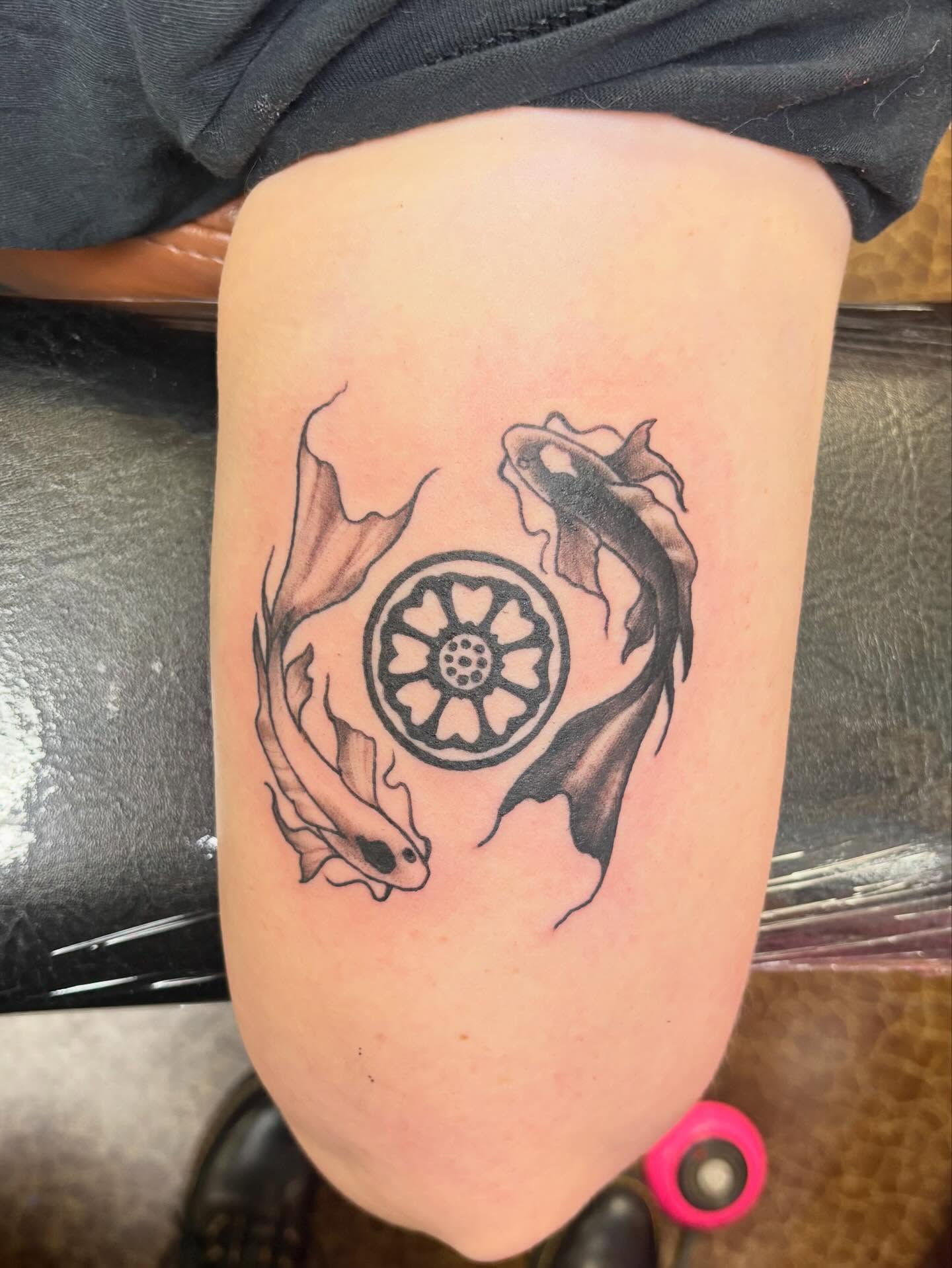 Koi fish and lotus black and grey tattoo on the thigh by Gabby, Kansas City, Missouri