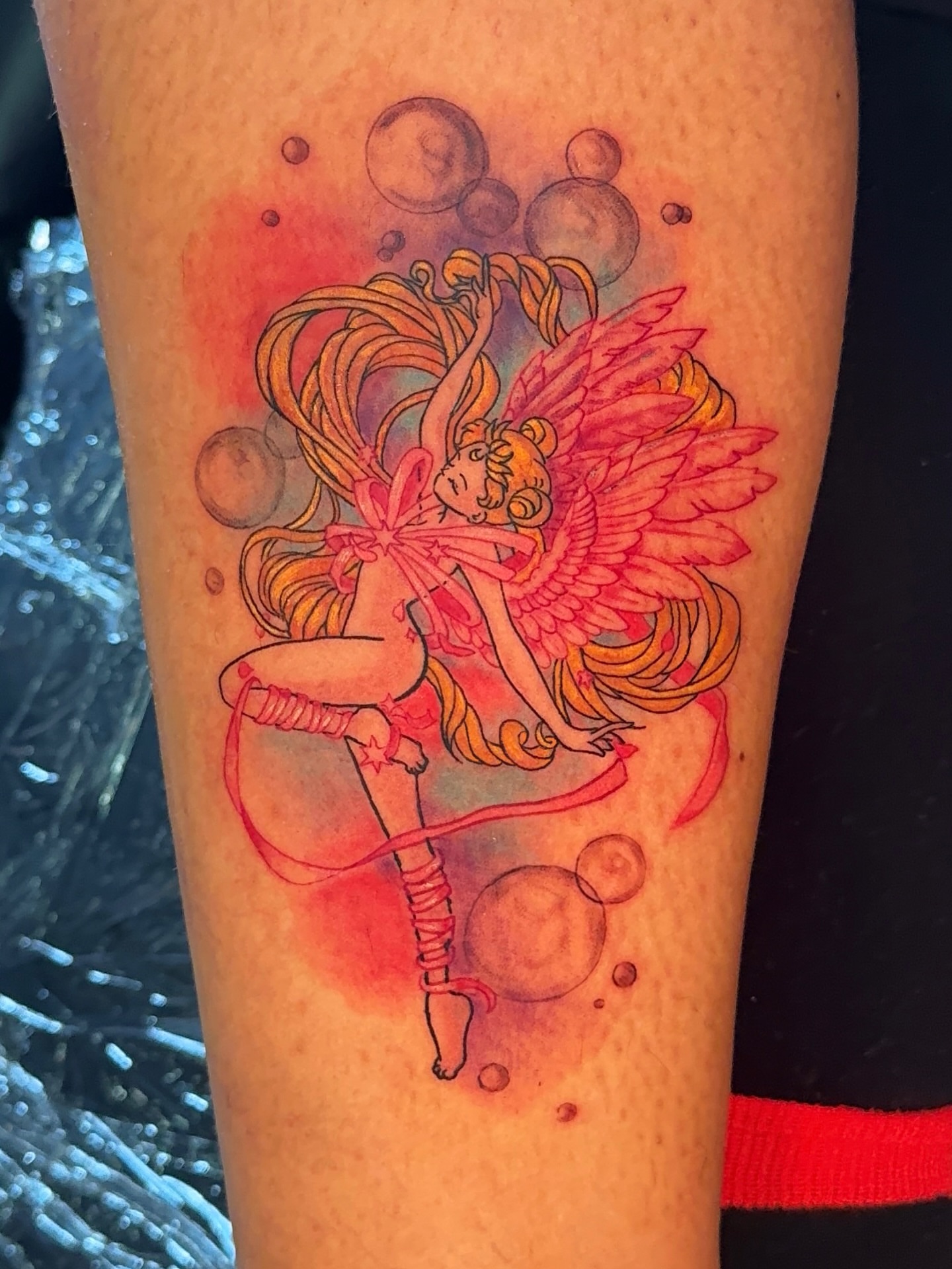 Fairy watercolor tattoo on the forearm by Ericka Hampton, Ferndale, Michigan