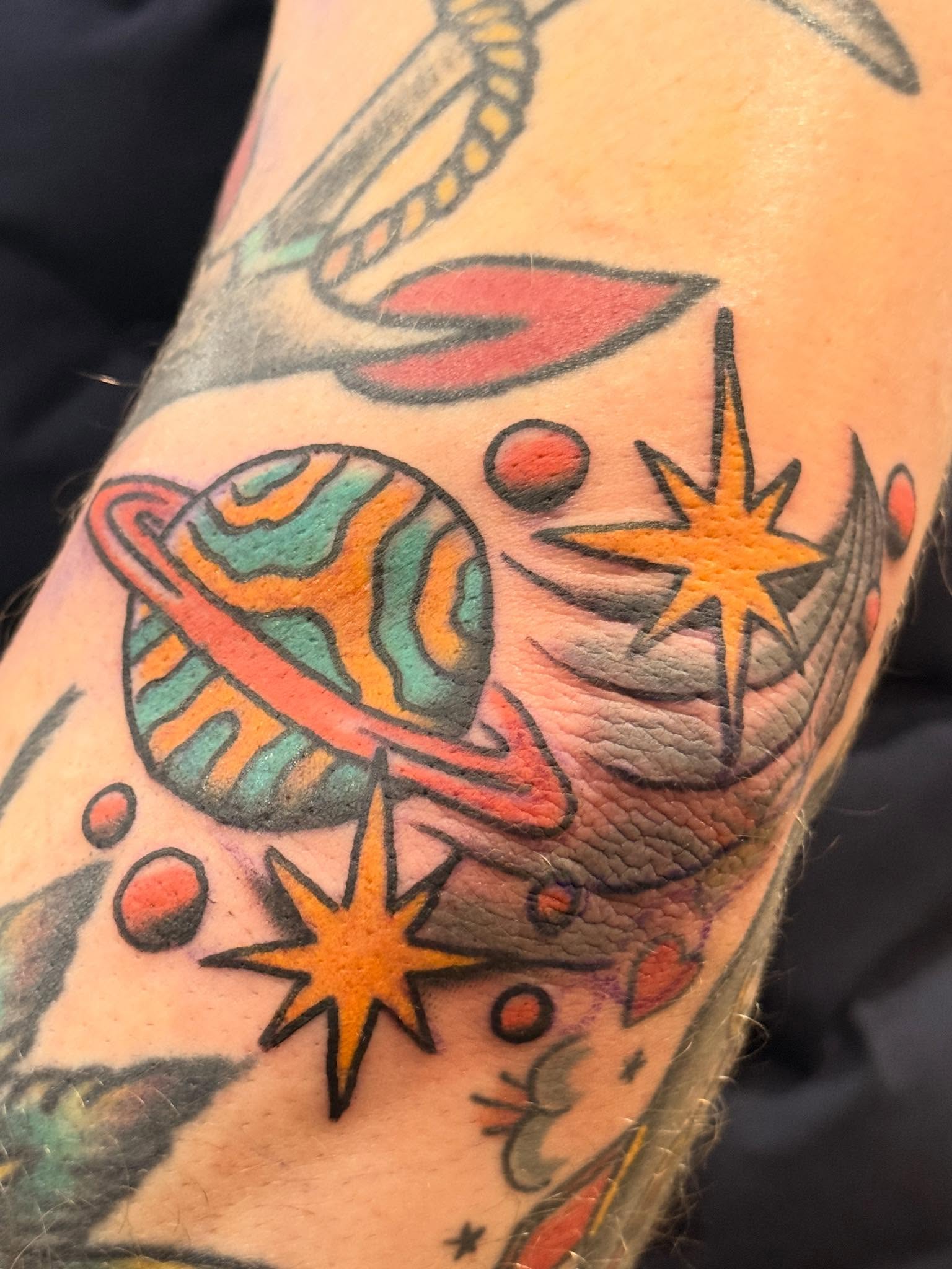 Space-themed tattoo American traditional tattoo on the forearm by 🕸curtis Fink🕸