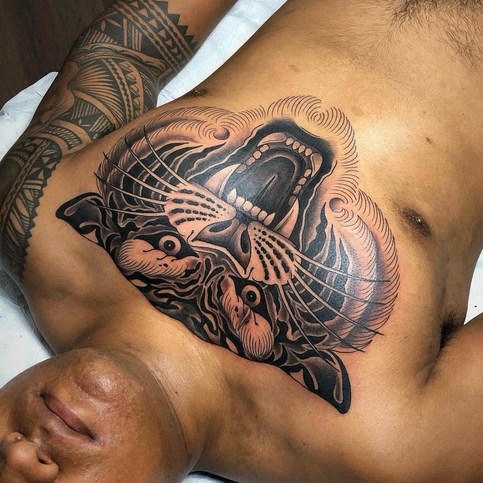 Fish geometric tattoo on the chest by Ｊｉｍ Ｓｙｌｖｉａ