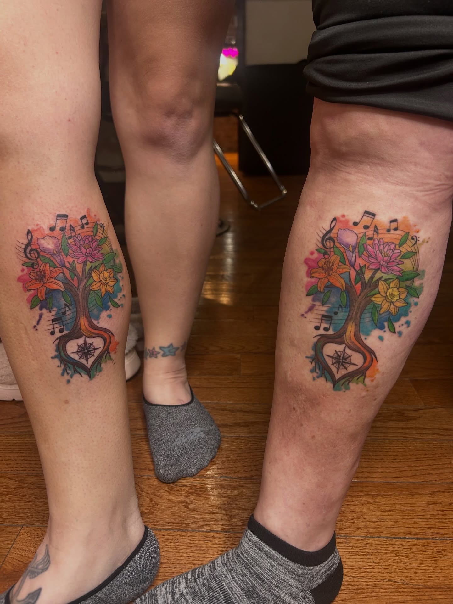 Flower tree watercolor tattoo on the leg by Kaylee