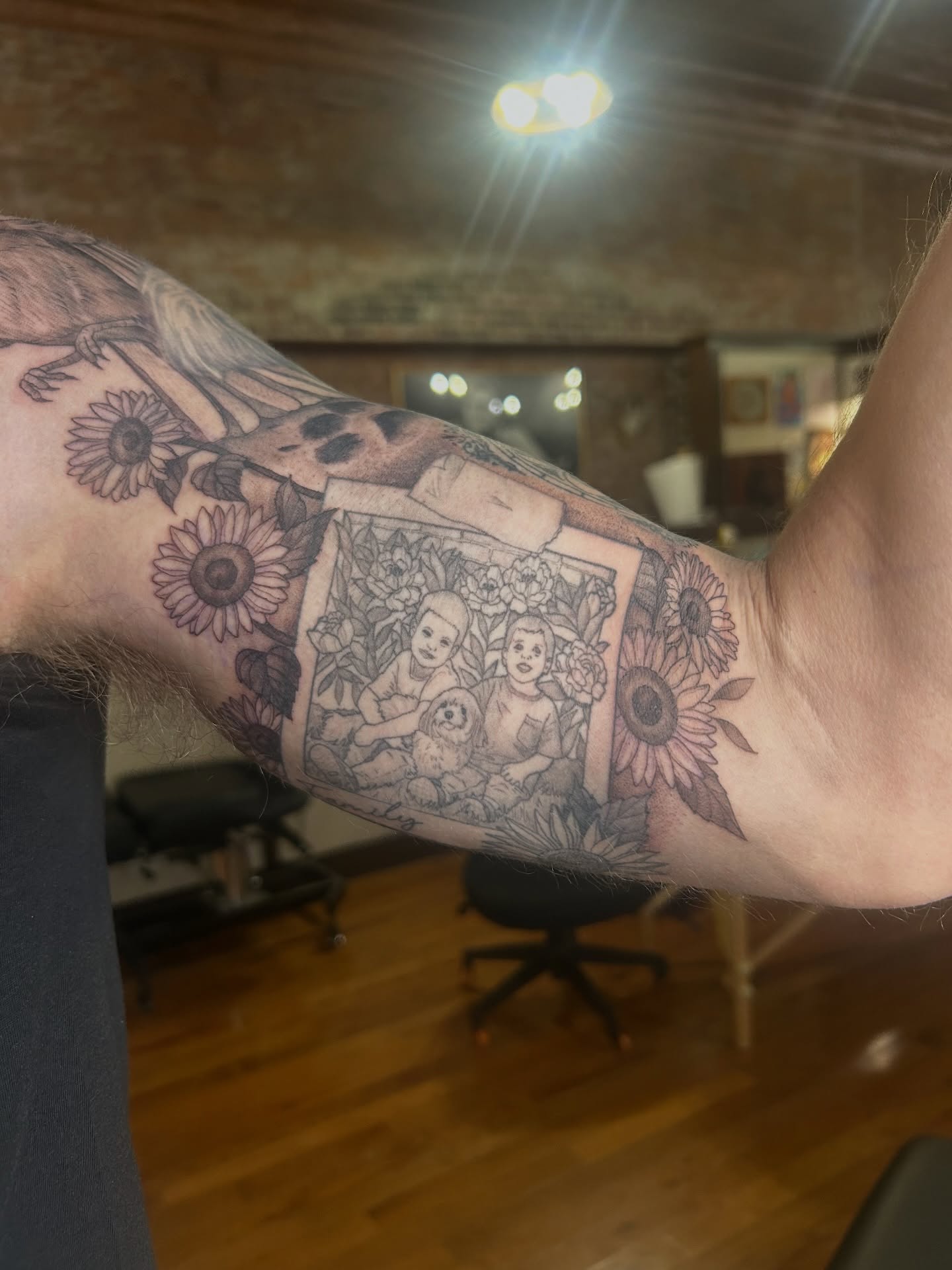 Children and dog realism tattoo on the forearm by Kaylee