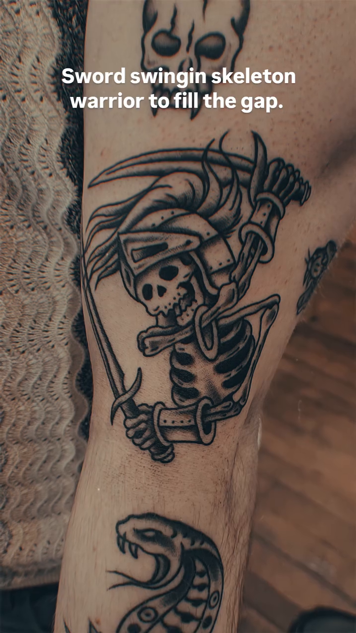 Skeleton warrior with sword and snake realism tattoo on the forearm by Douglas Grady