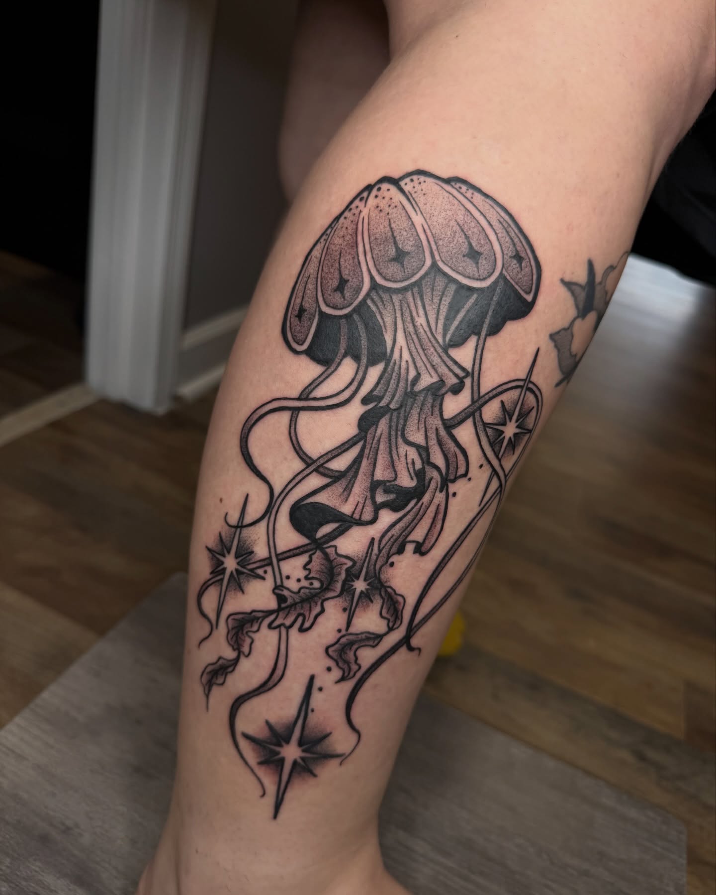 Jellyfish dotwork tattoo on the forearm by Jezza Munson