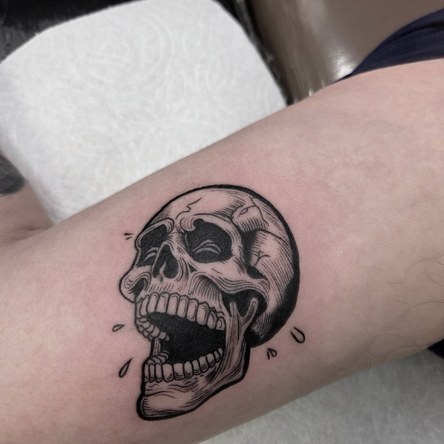 Skull black and grey tattoo on the forearm by Yvette Cebreros