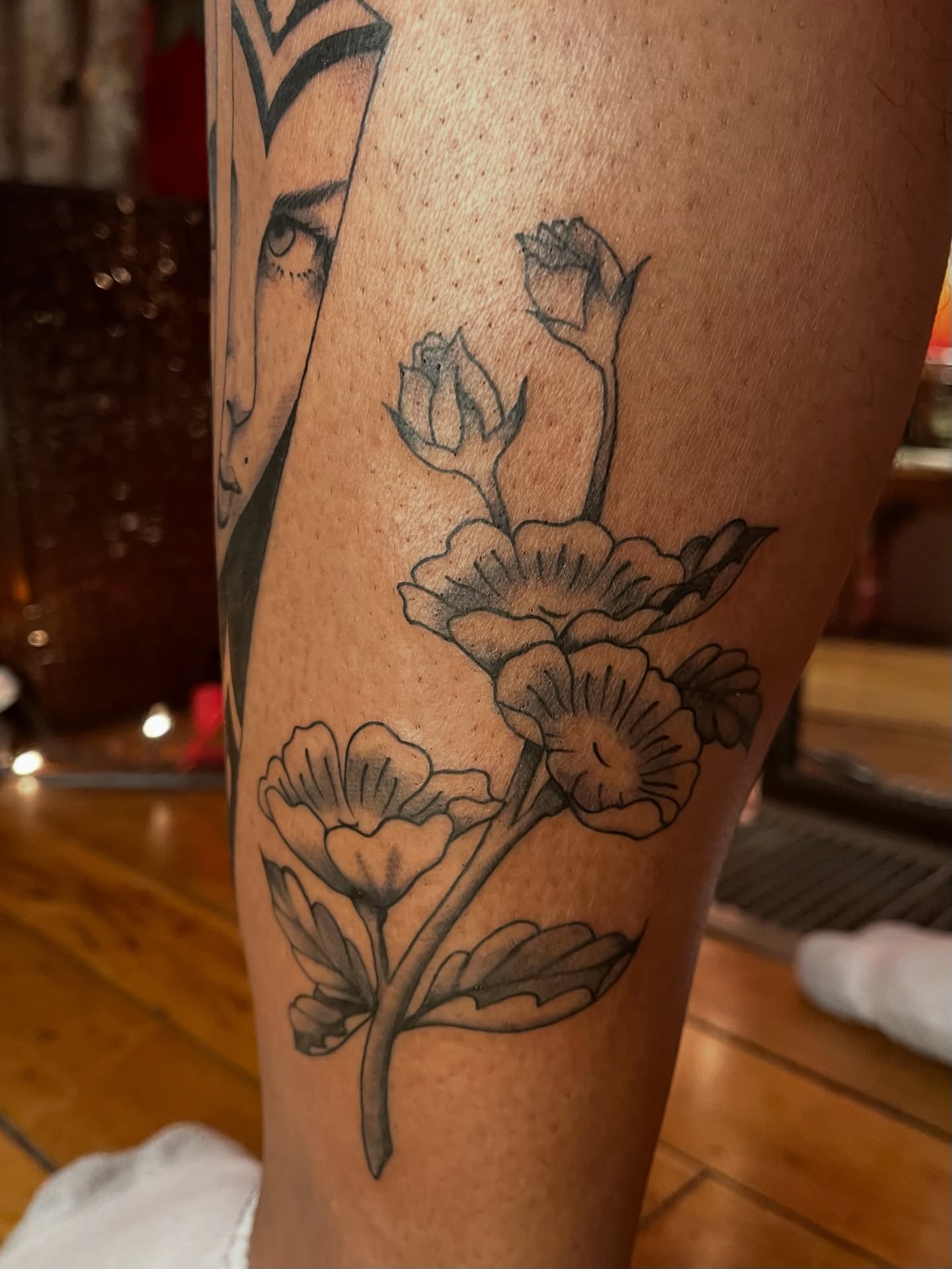 Flowers black and grey tattoo on the forearm by Zoe Phan, Richmond, Virginia