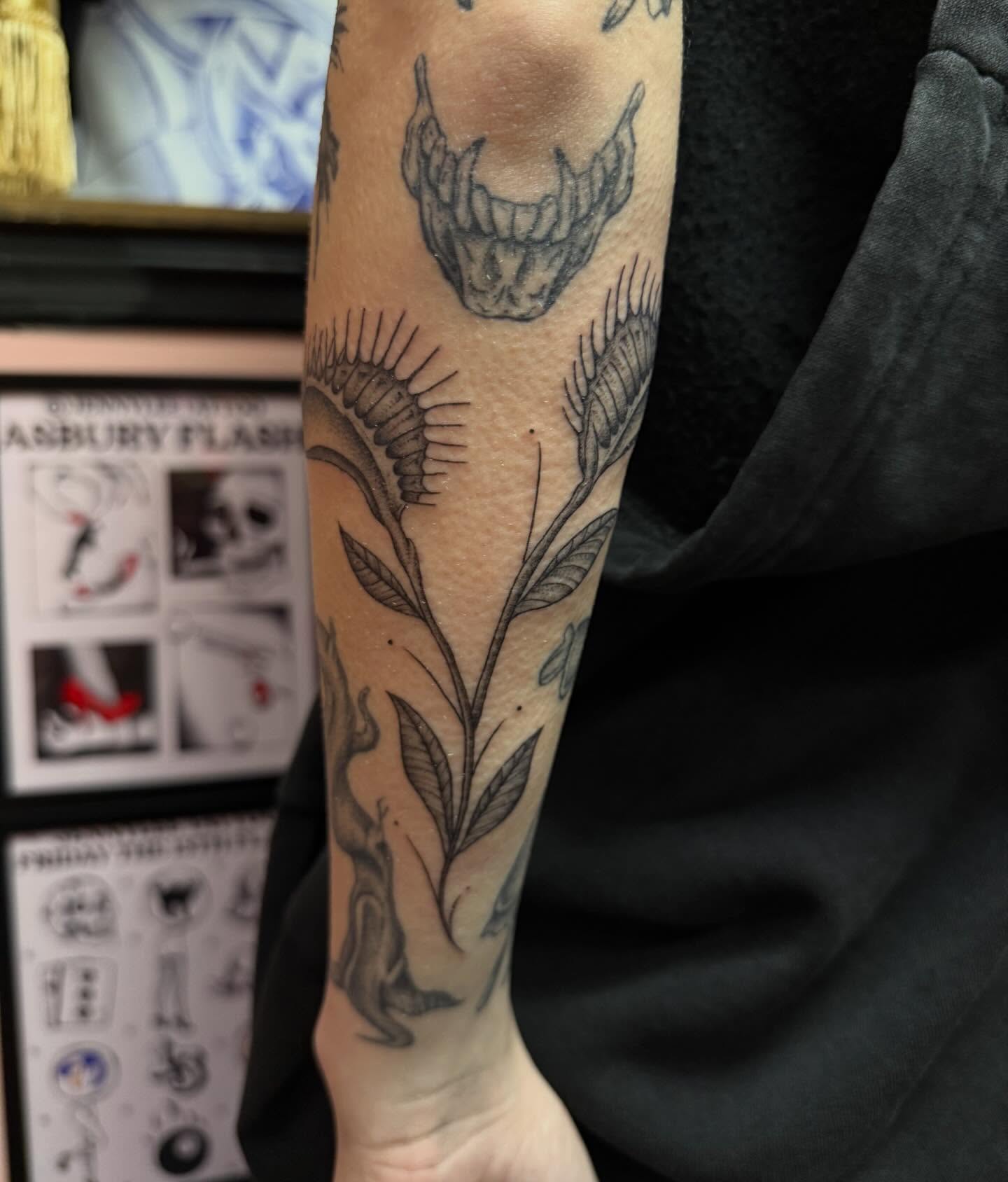 Plant and dragon realism tattoo on the forearm by Jennylee Aerts, Asbury Park, New Jersey