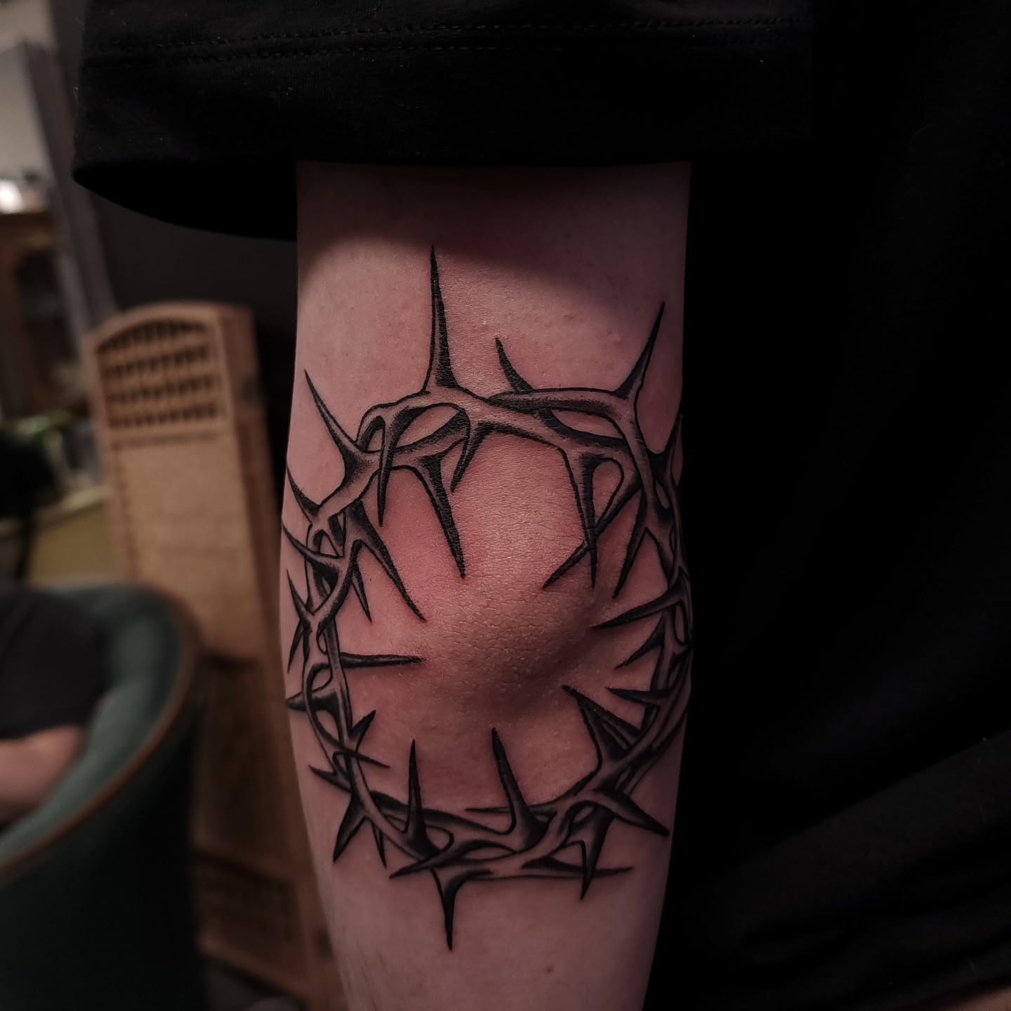 Crown of thorns black and grey tattoo on the forearm by xavia