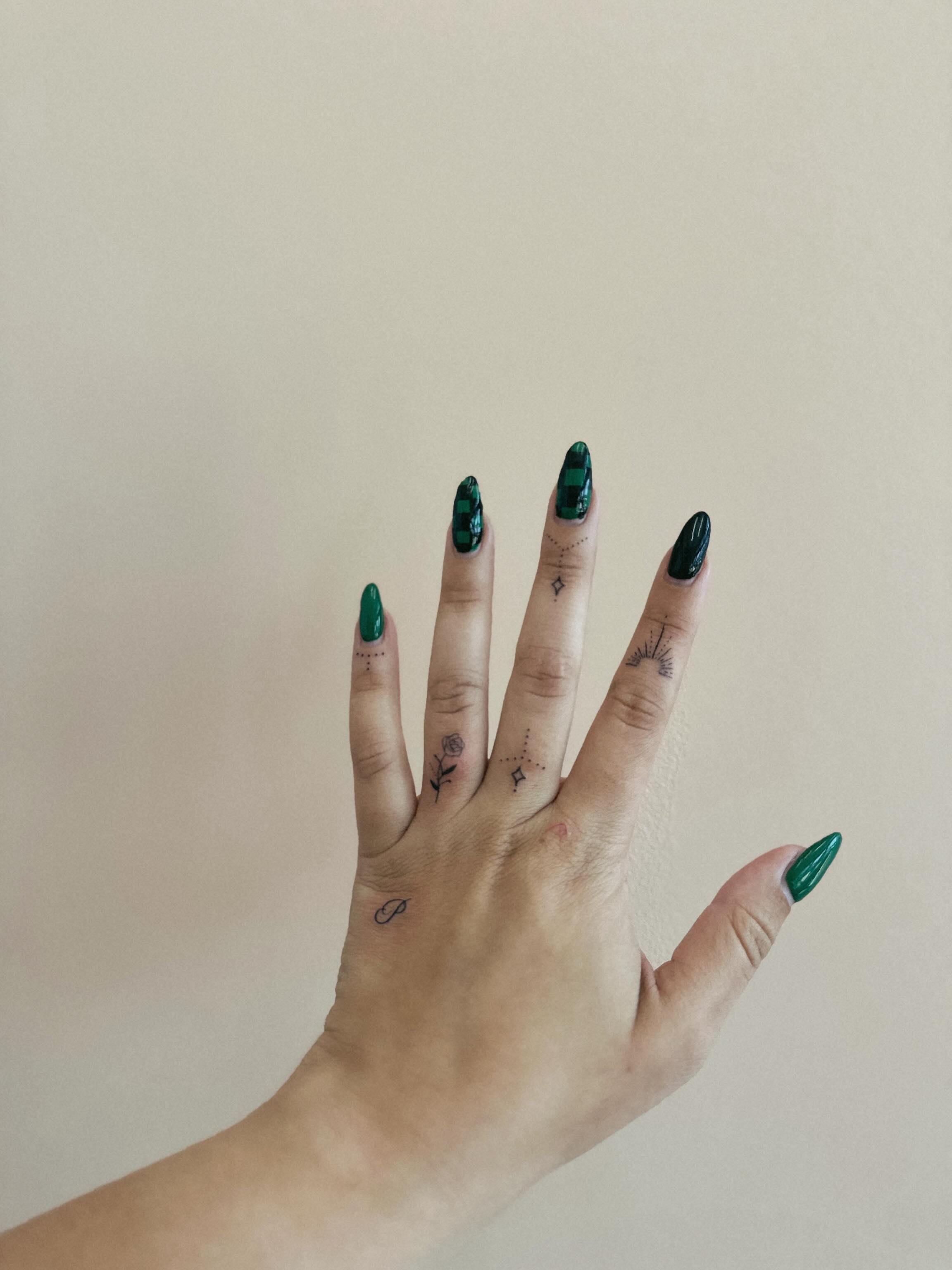 Finger tattoos dotwork tattoo on the hand by Allie