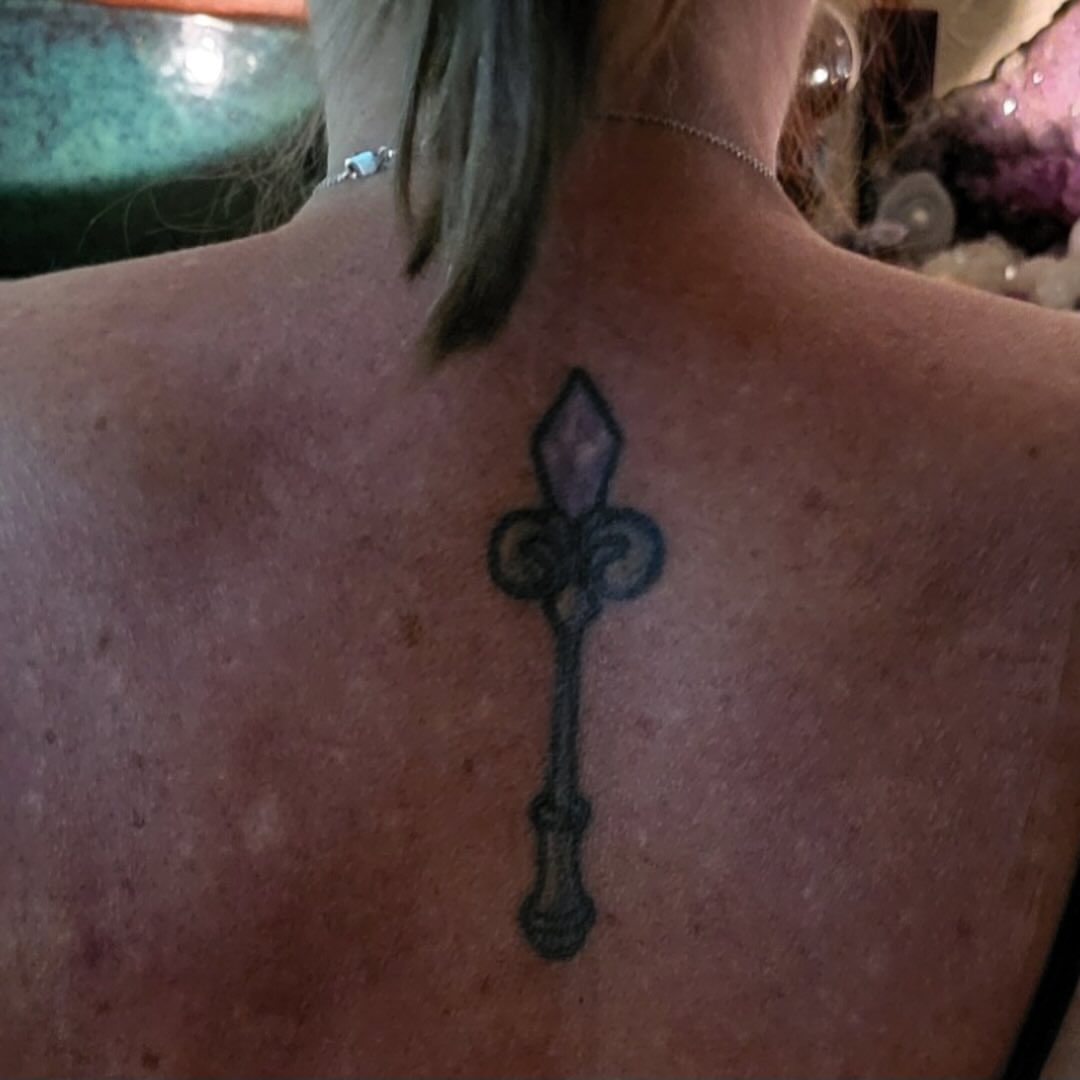 Key black and grey tattoo on the back by 𓉸ྀི lola hoax tattoos𓉸ྀི