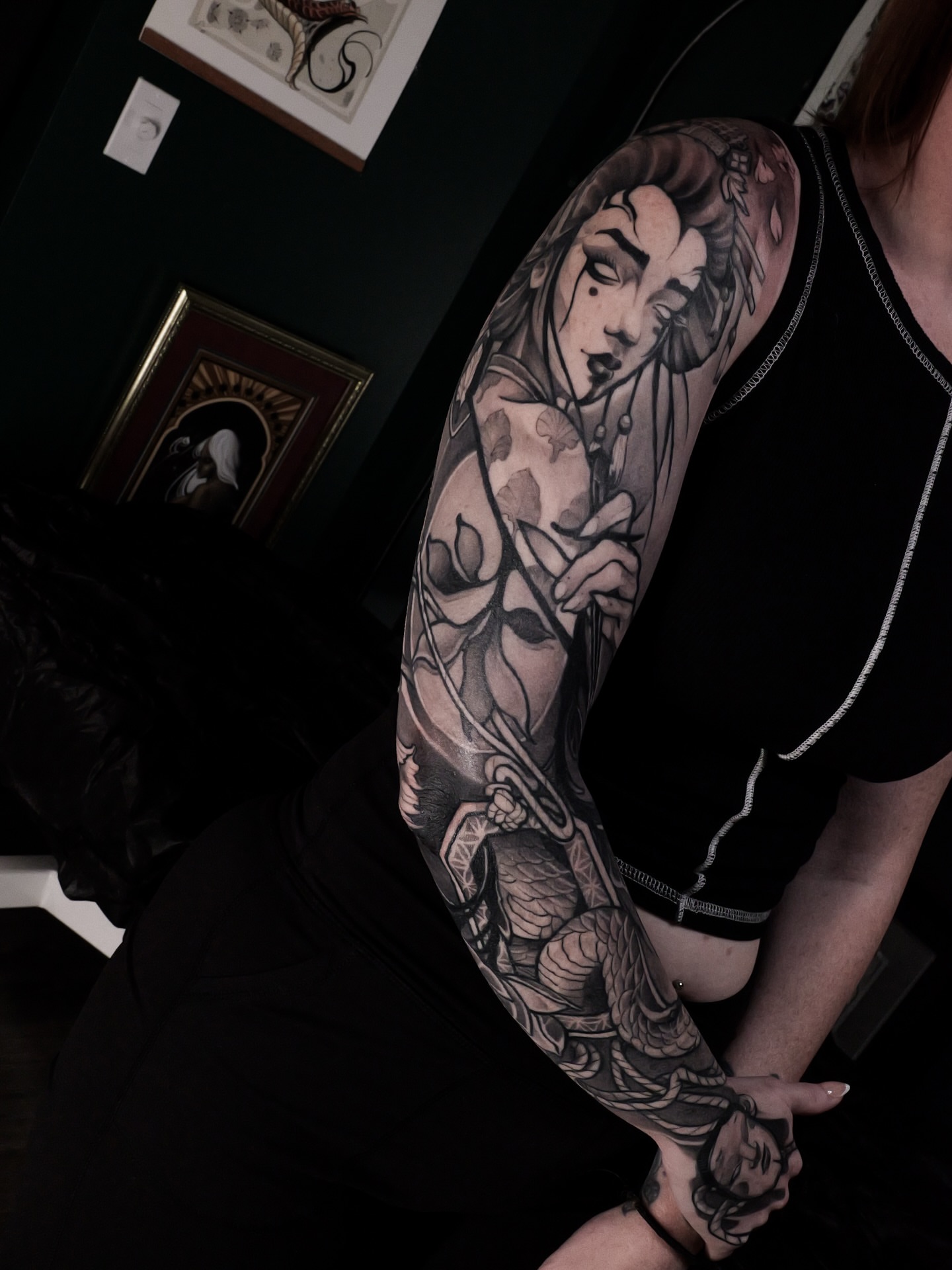 Woman with tree realism tattoo on the upper arm by Joshua Weeks