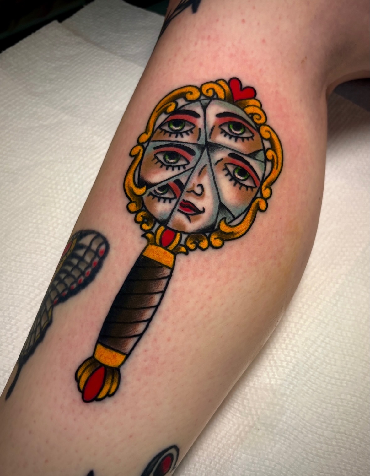 Mirror American traditional tattoo on the forearm by Mickey Putillo, Charlotte, North Carolina