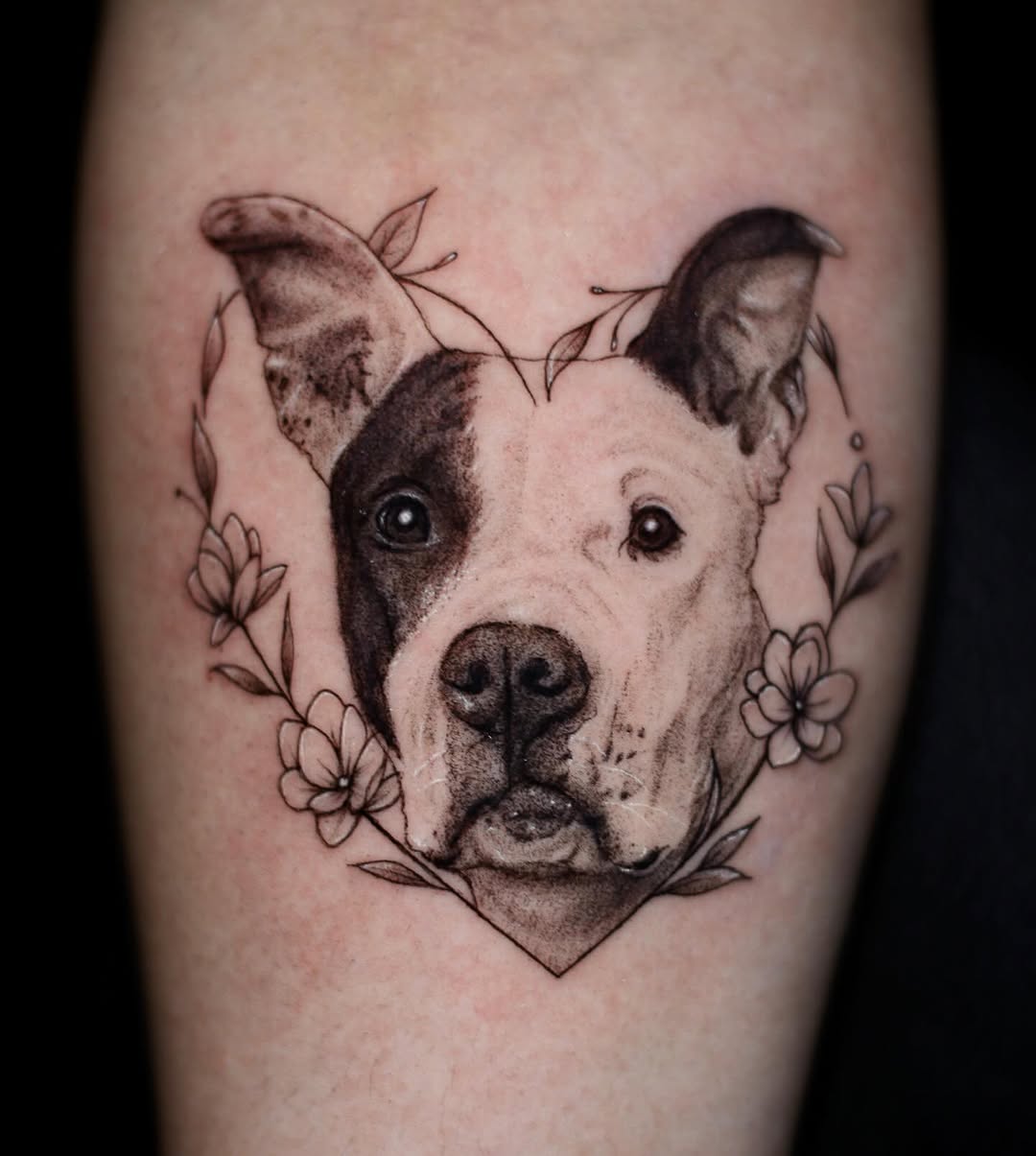 Pitbull portrait with flowers realism tattoo on the forearm by 𝐒𝐡𝐞𝐫𝐥𝐥𝐲