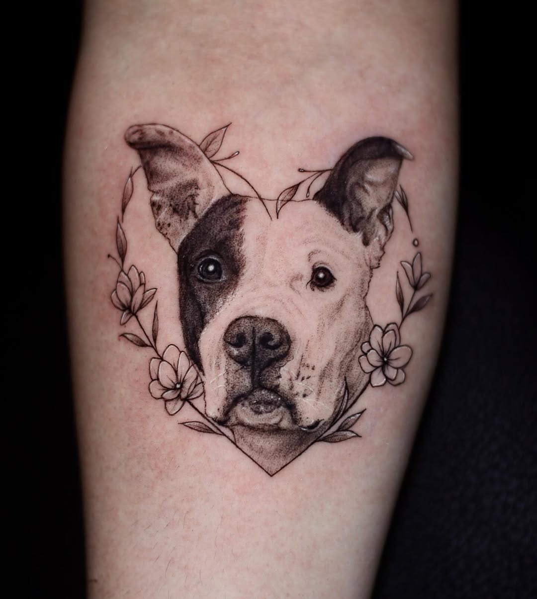 Dog portrait with flowers realism tattoo on the forearm by 𝐒𝐡𝐞𝐫𝐥𝐥𝐲