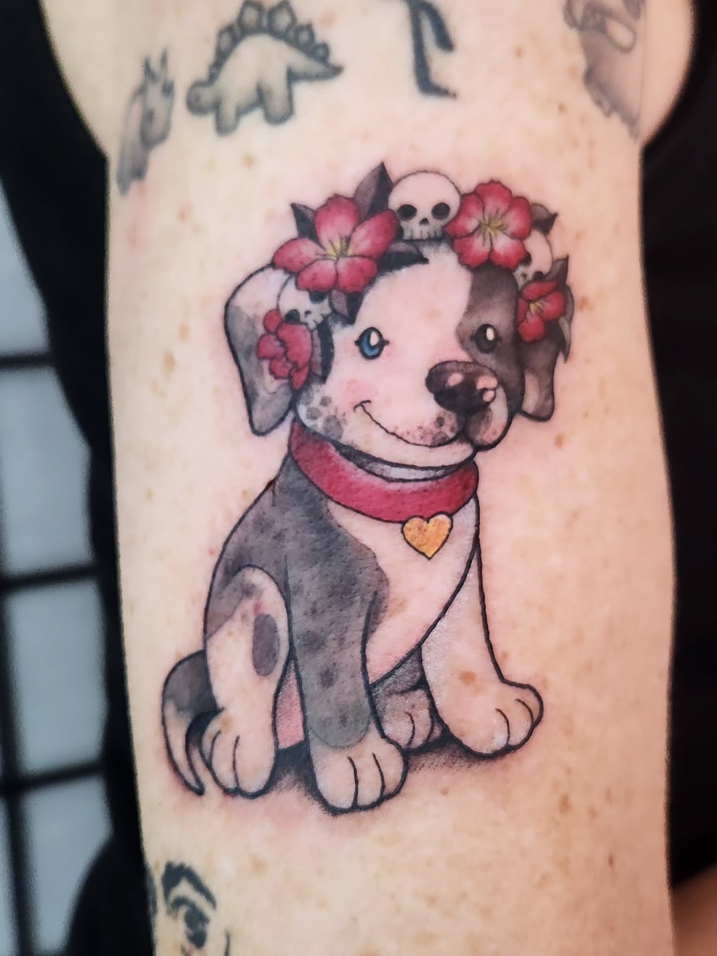 Puppy with flowers dotwork tattoo on the forearm by Amanda Boyd - Duh!