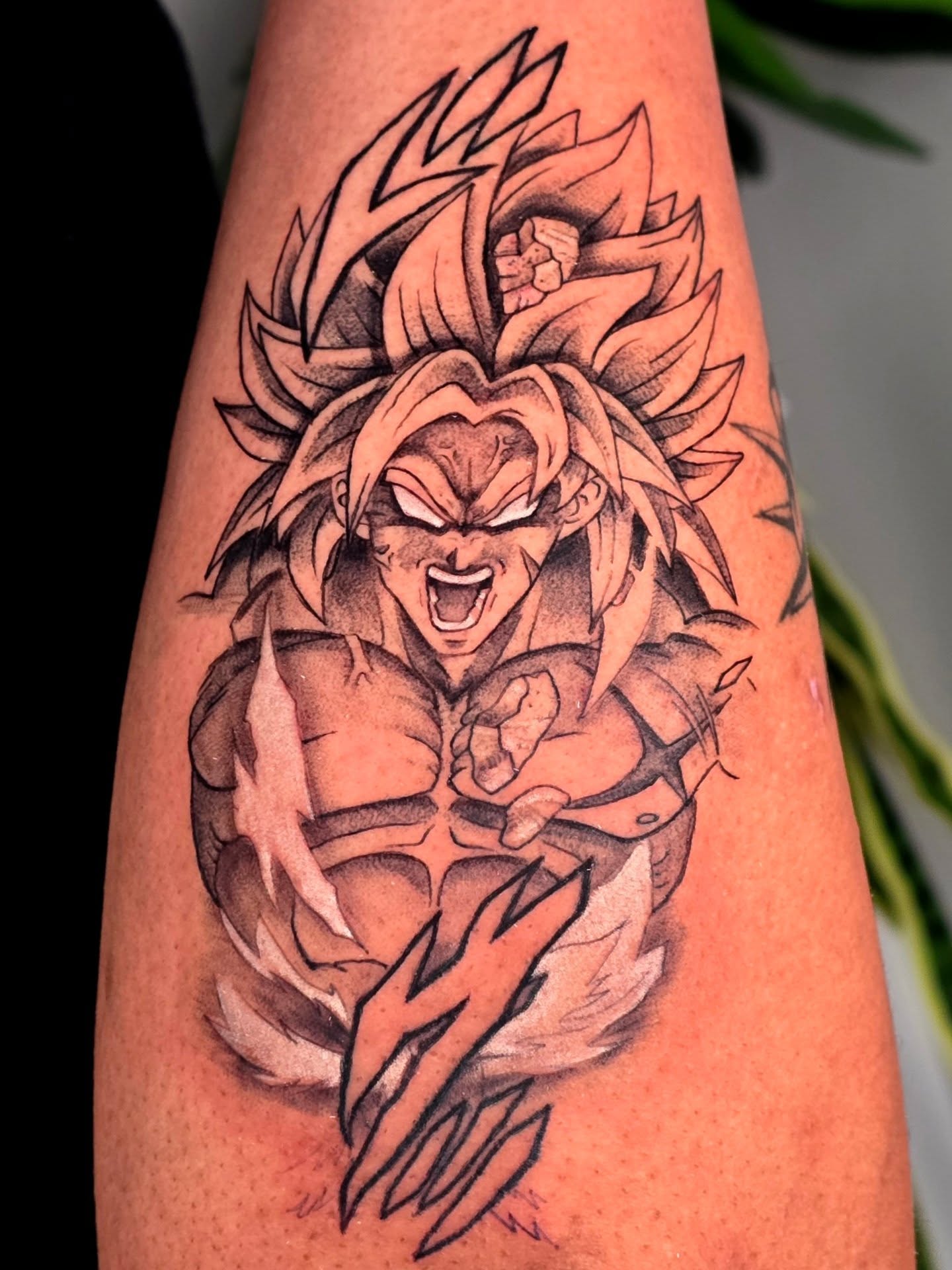 Super saiyan anime tattoo on the forearm by Scribbles (Teala René), Charlotte, North Carolina