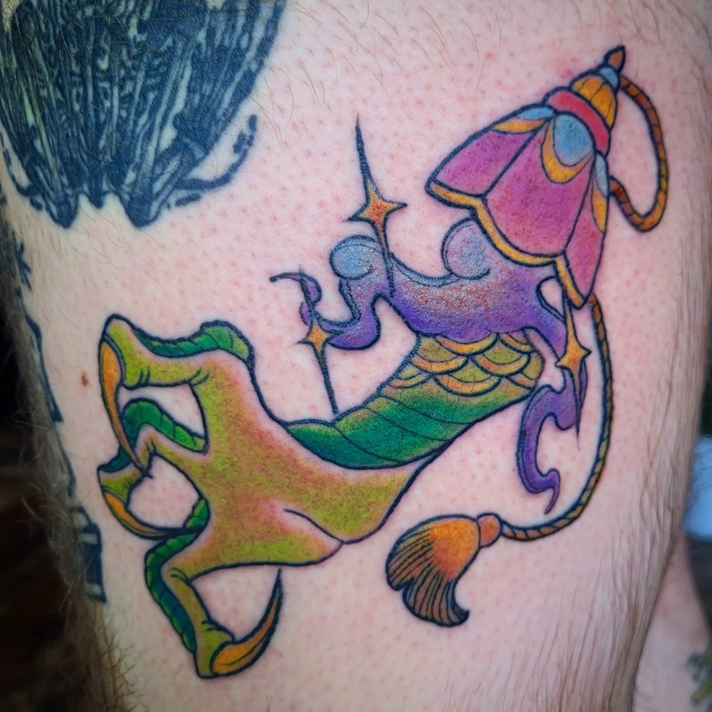 Mermaid American traditional tattoo on the thigh by Ashley Thomas, Midvale, Utah