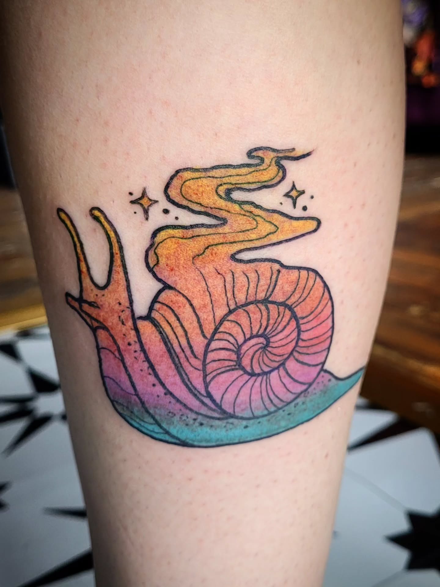 Snail new school tattoo on the forearm by Ashley Thomas, Midvale, Utah