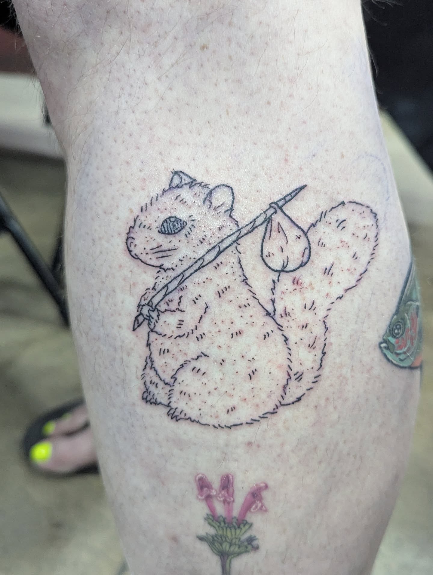 Squirrel with paintbrush black and grey tattoo on the forearm by Patricio