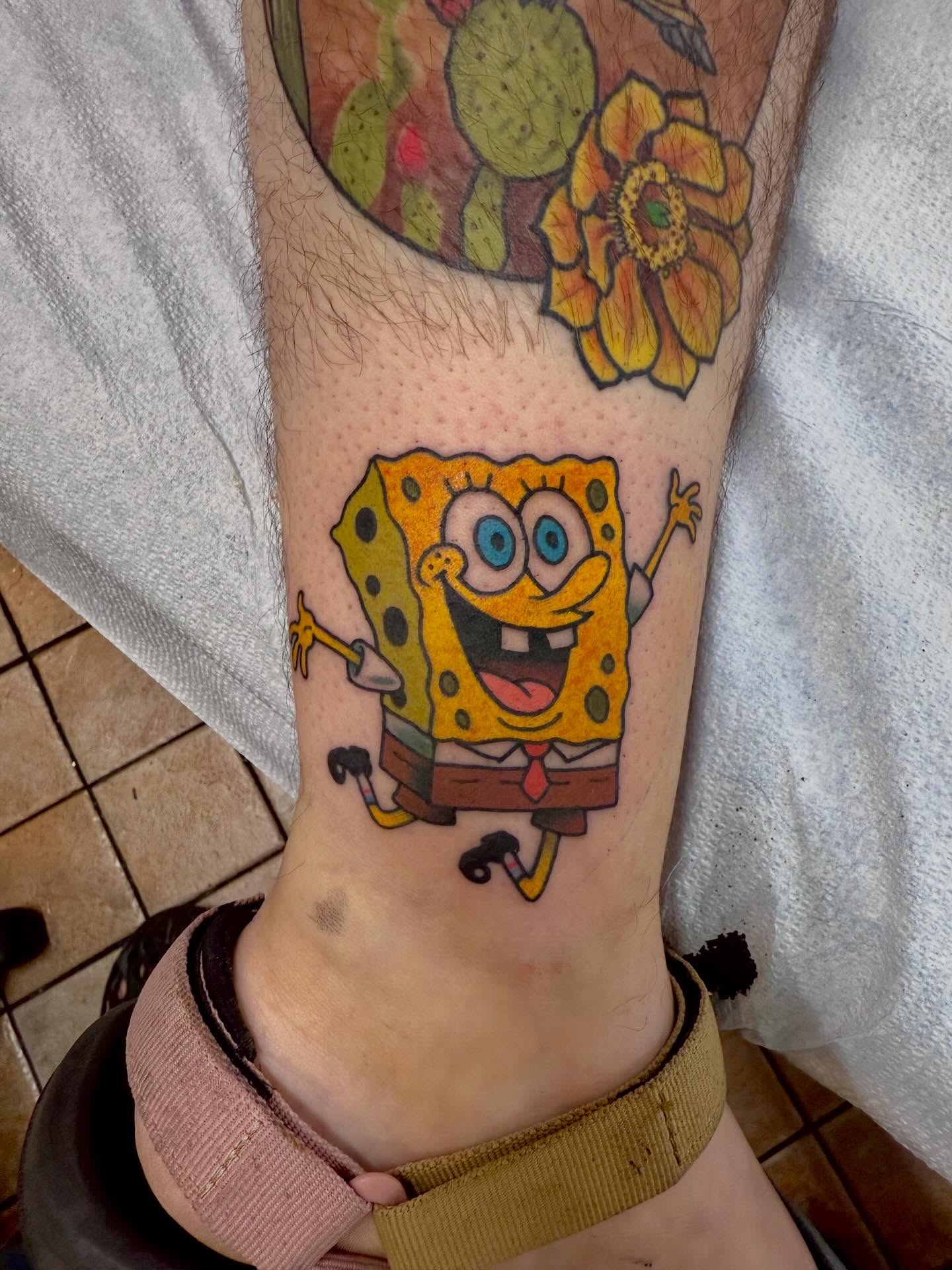 SpongeBob SquarePants new school tattoo on the forearm by Matt Paw