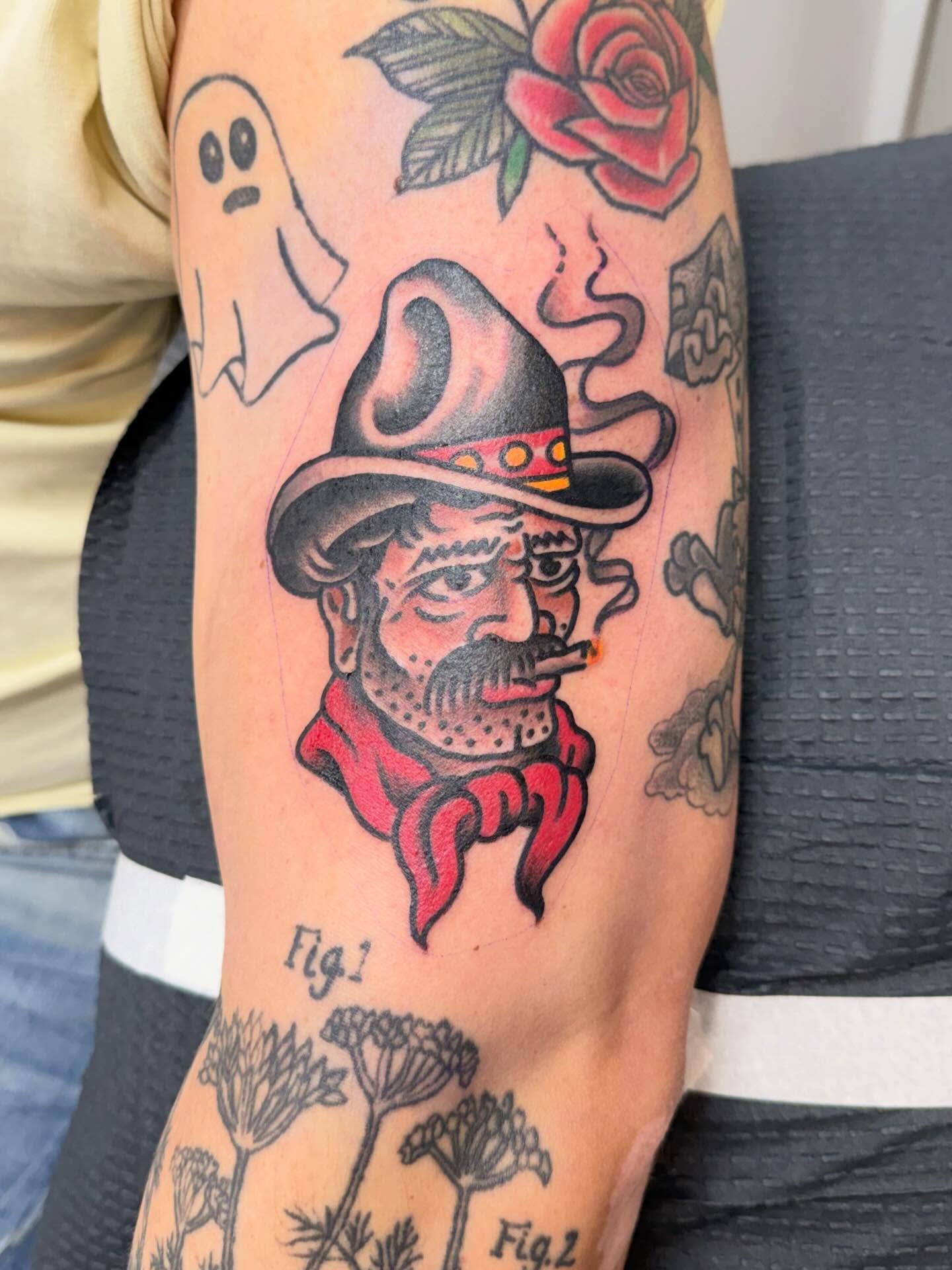 Cowboy with mustache American traditional tattoo on the forearm by Matt Paw