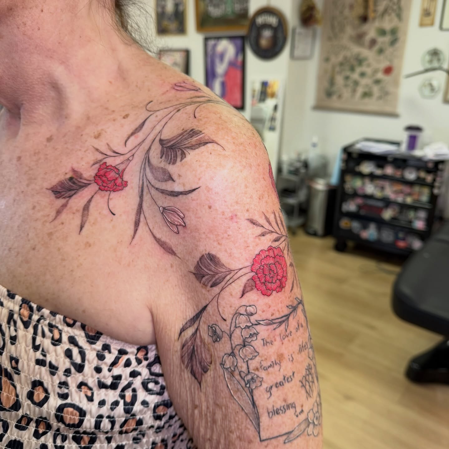 Floral design black and grey tattoo on the shoulder by Dani Fried Tattoos