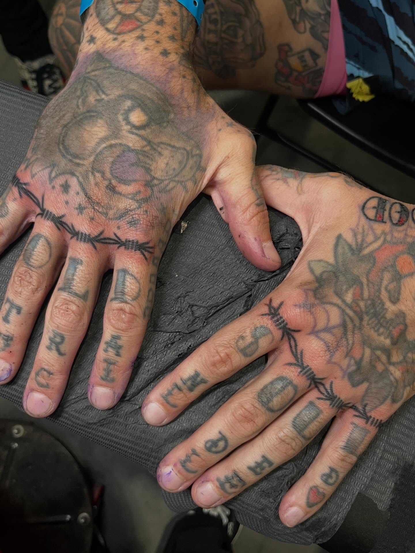 Tattooed hands American traditional tattoo by Jake LiCausi