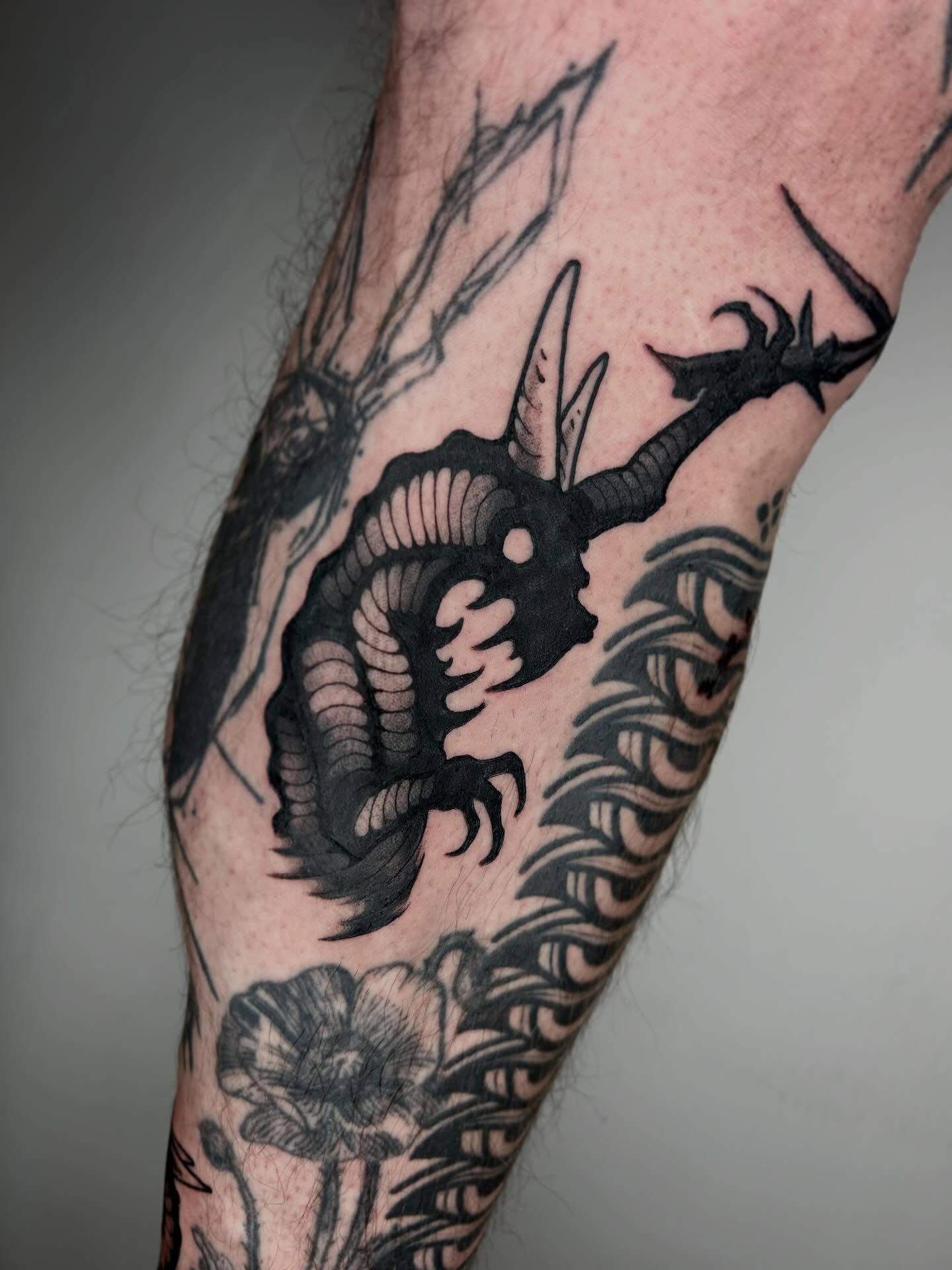 Tattoo by @da.voide_tattoo — black_and_grey