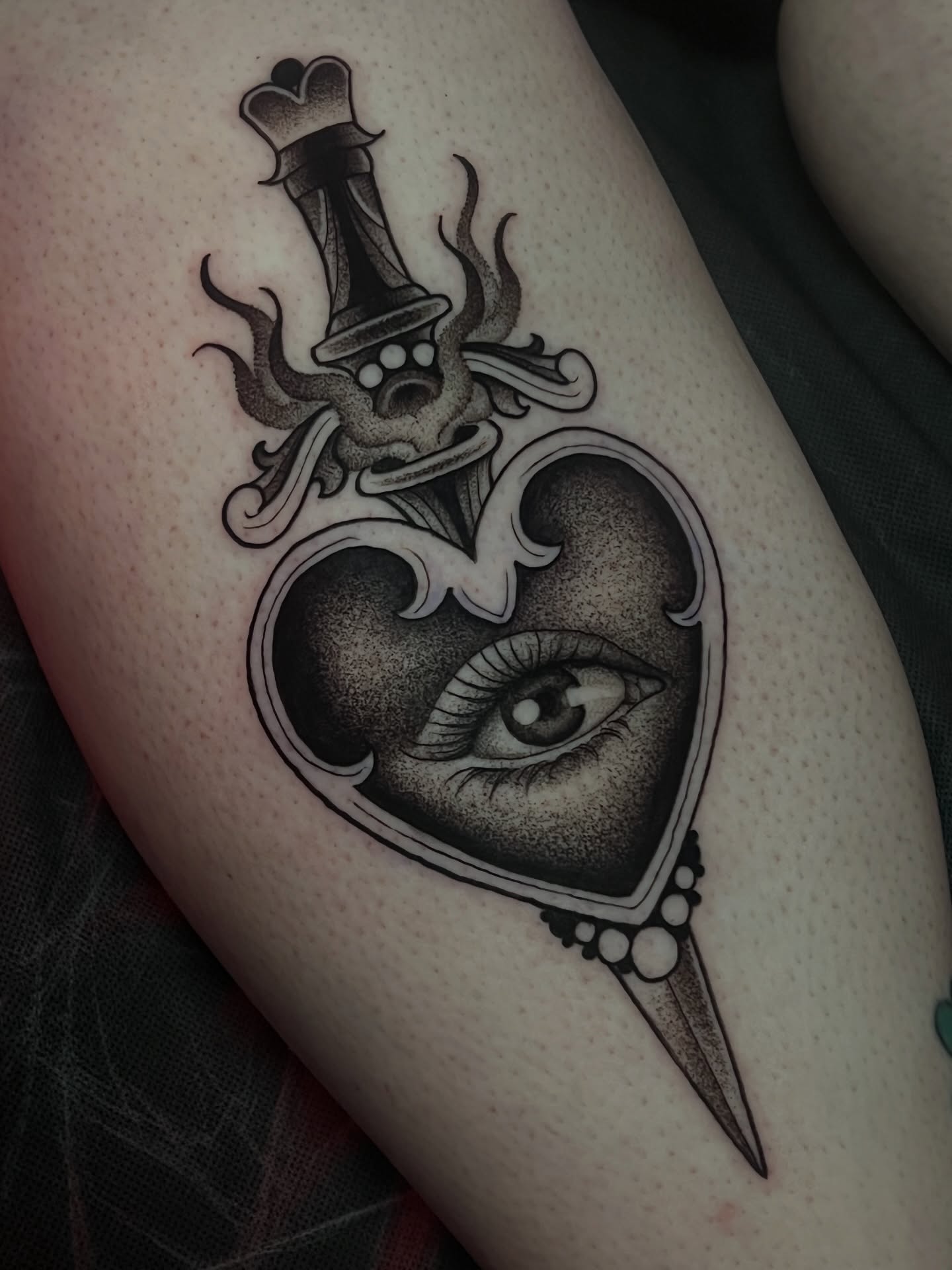 Eye and heart dotwork tattoo on the thigh by πΊπππππ π»πππππππ