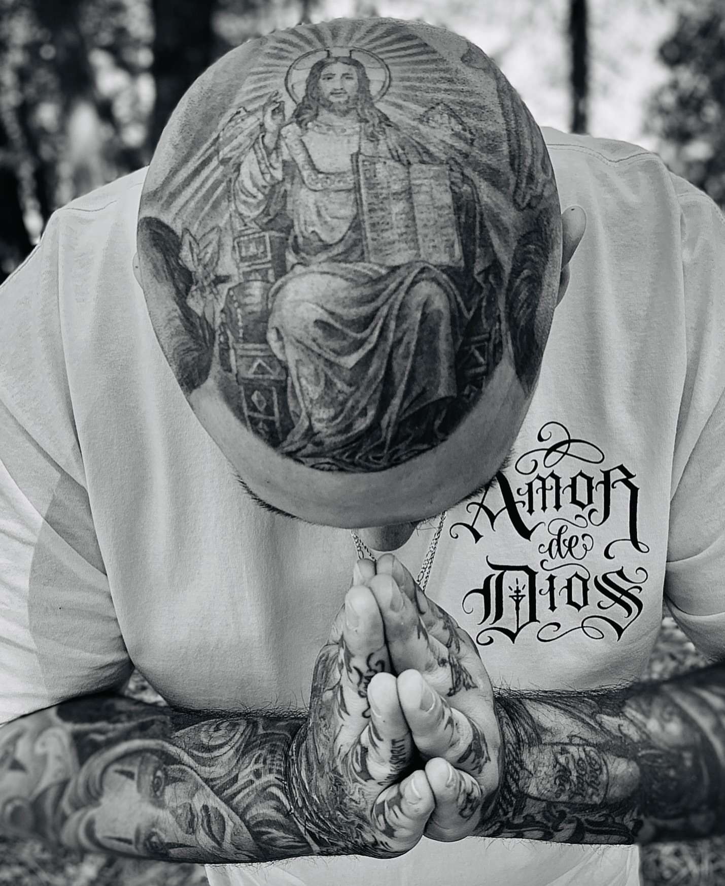 Religious figure black and grey tattoo on the head by F e A R