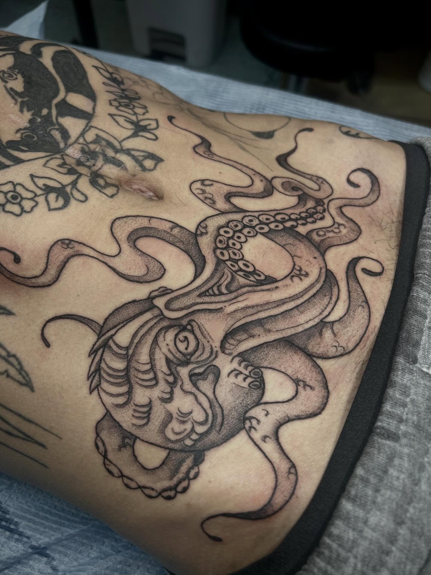Octopus American traditional tattoo on the thigh by Bria🩸